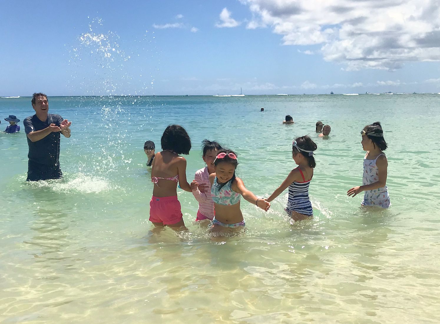 Jerry and children playing together in Hawaii