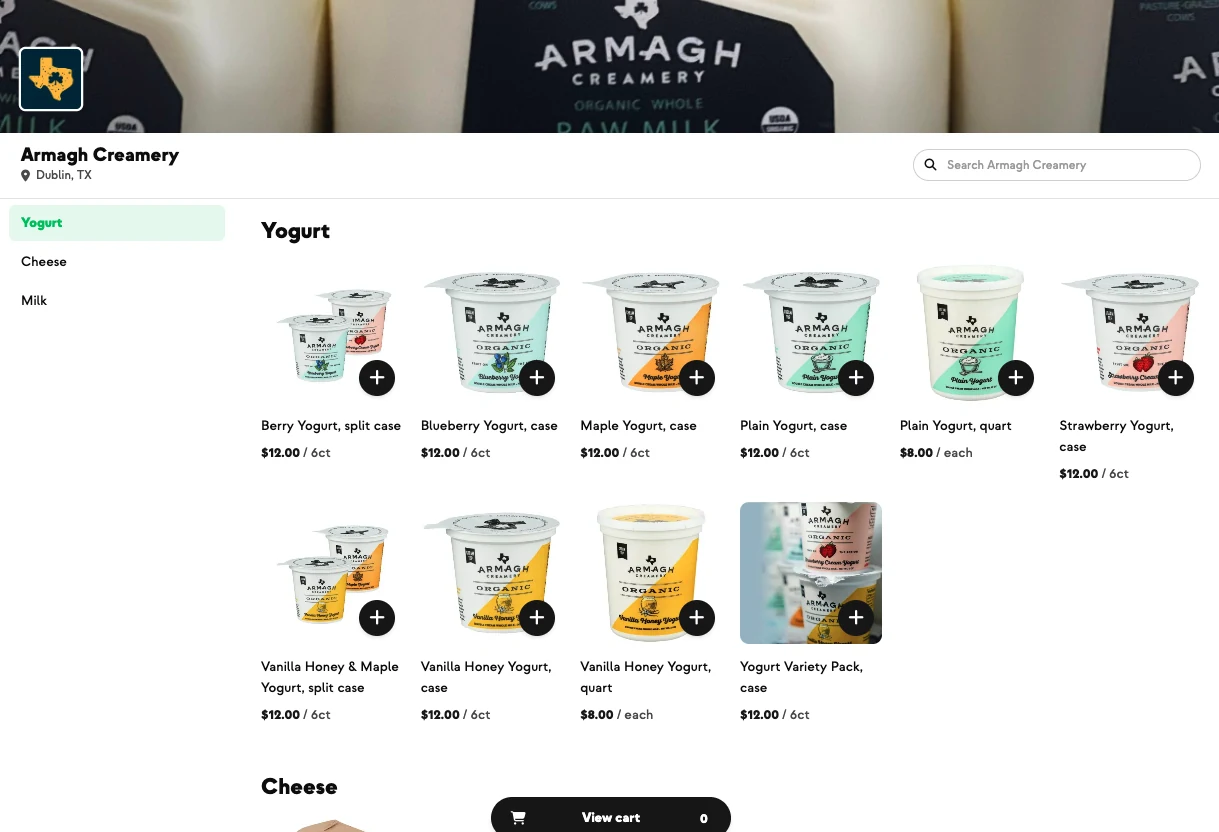 The Armagh Creamery storefront, showing raw milk, yogurt and cheese with prices