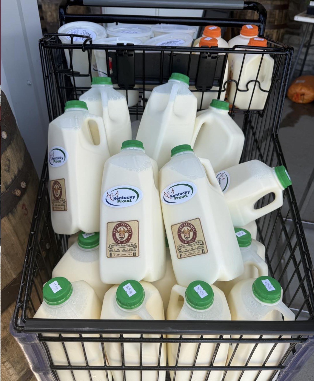 A crate of half gallon jugs packed for a pickup site