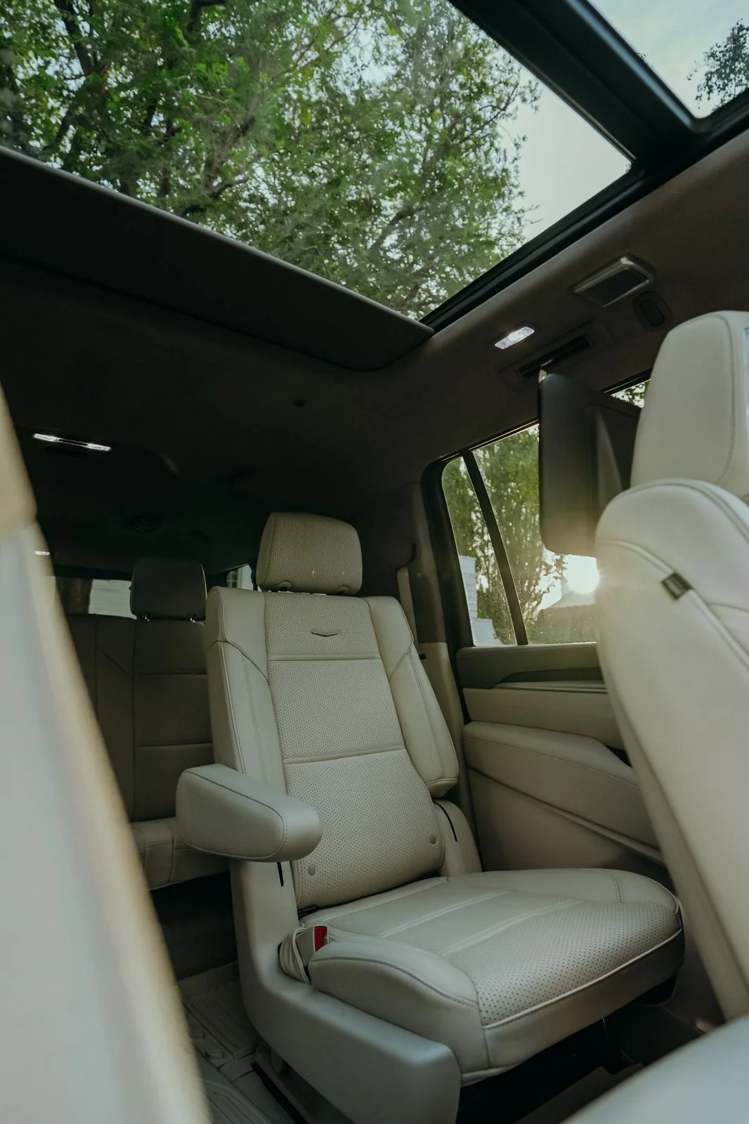 Cream leather passenger seats inside the chauffeur vehicle