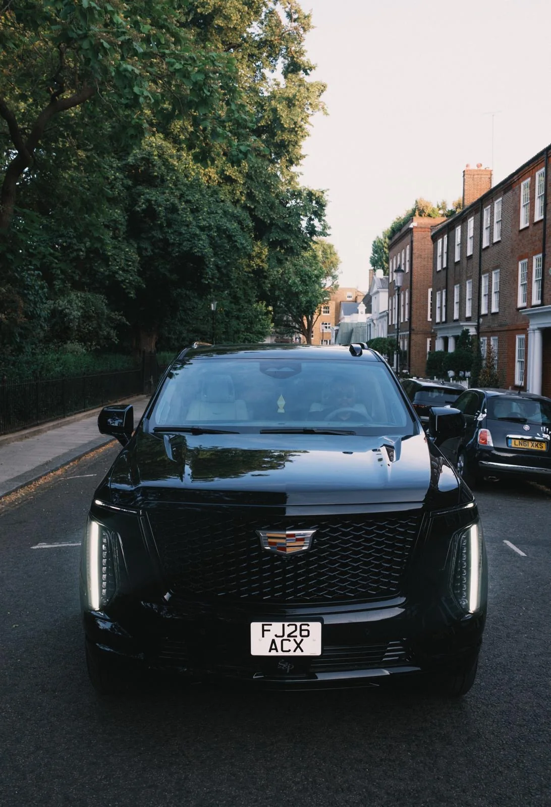 Black Veloria chauffeur vehicle photographed from the front