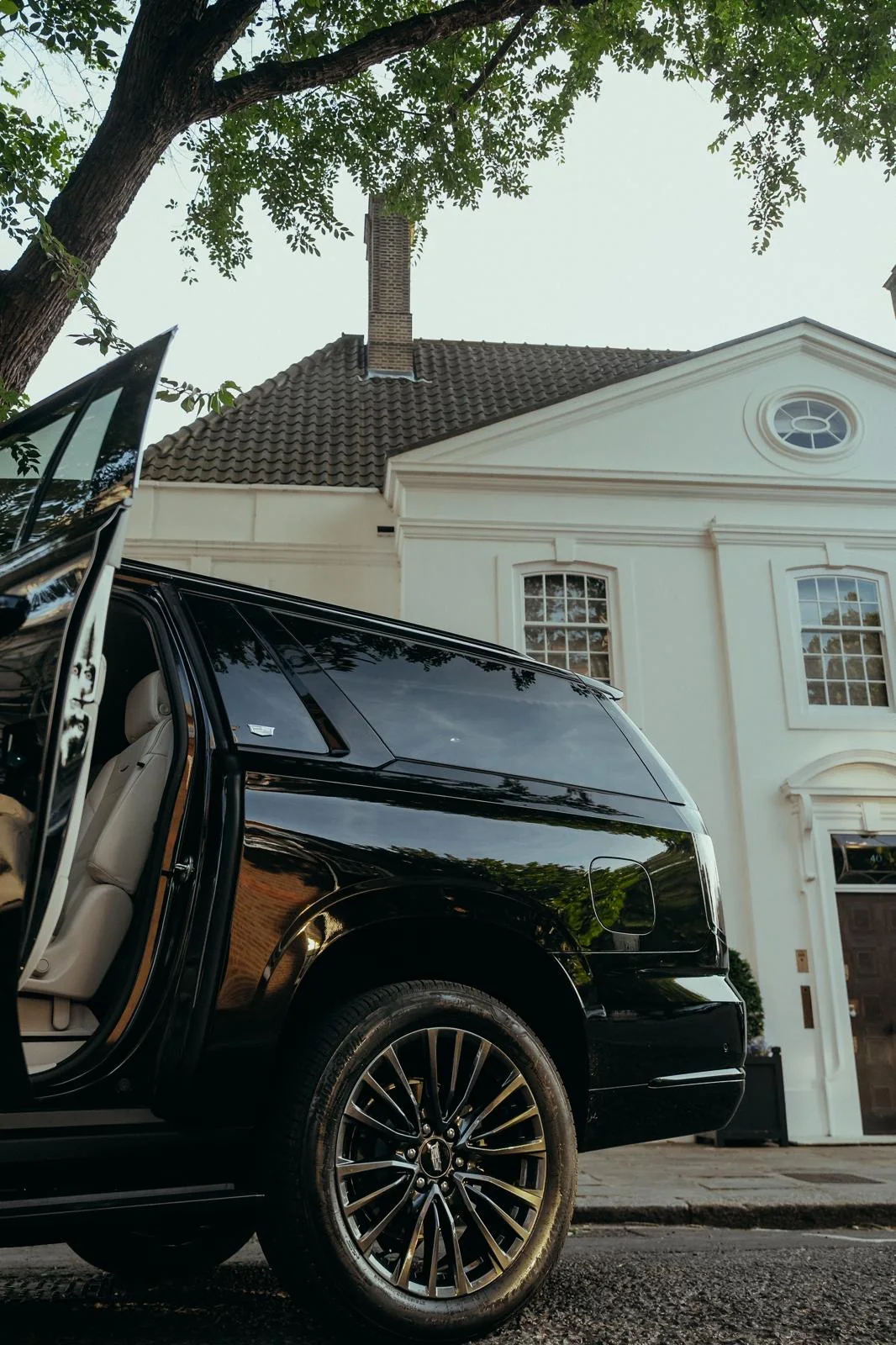 Veloria chauffeur SUV with rear door open