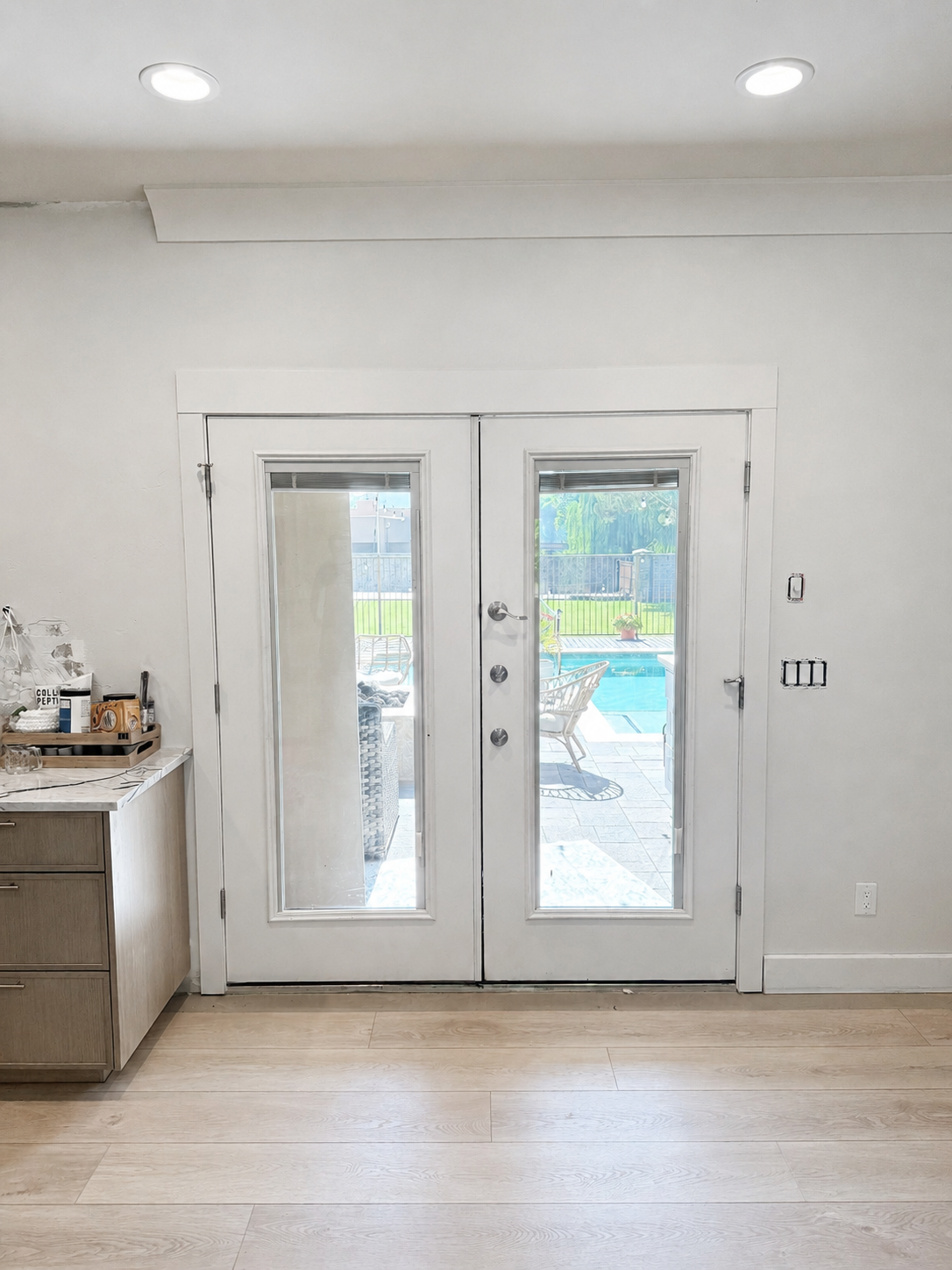 Original French doors before taller sliding door conversion
