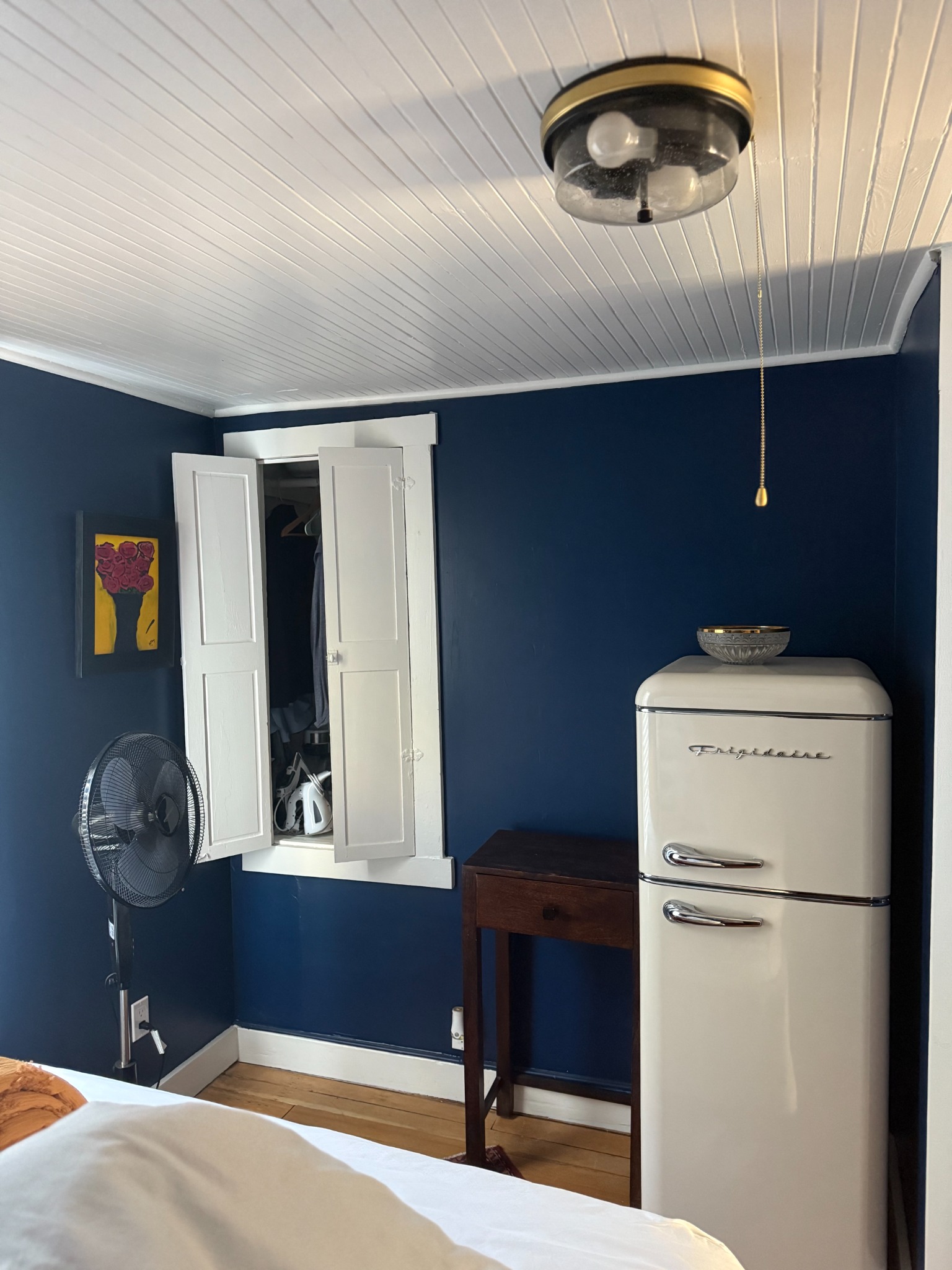 Small recessed cabinet before closet expansion