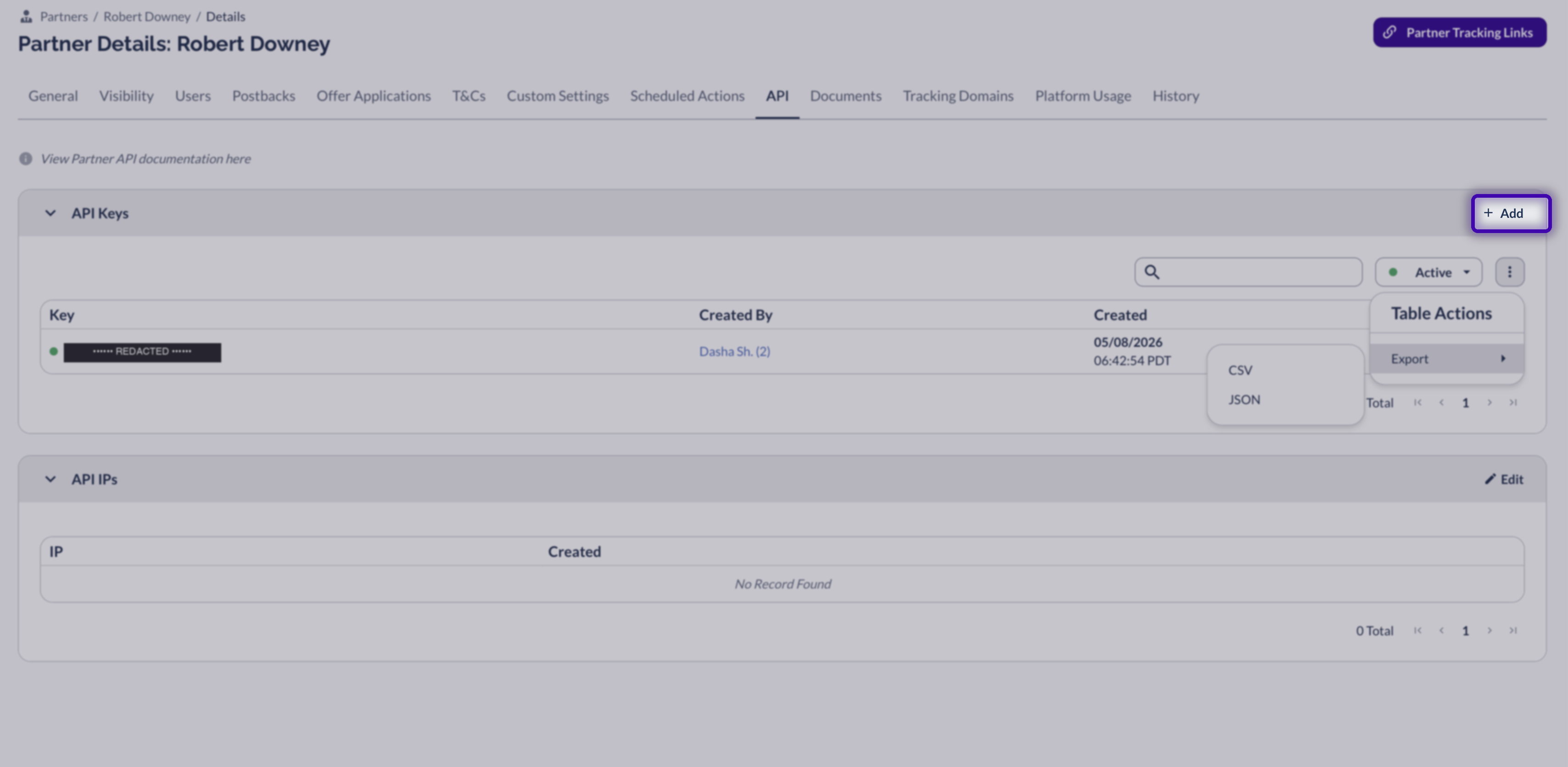 API Keys table showing the new key plus the Table Actions menu with Export to CSV/JSON option