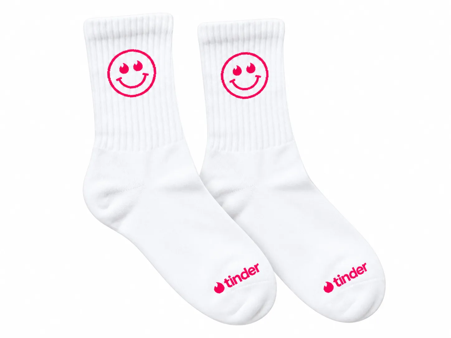 White Tinder socks with a pink flame-eye smiley face
