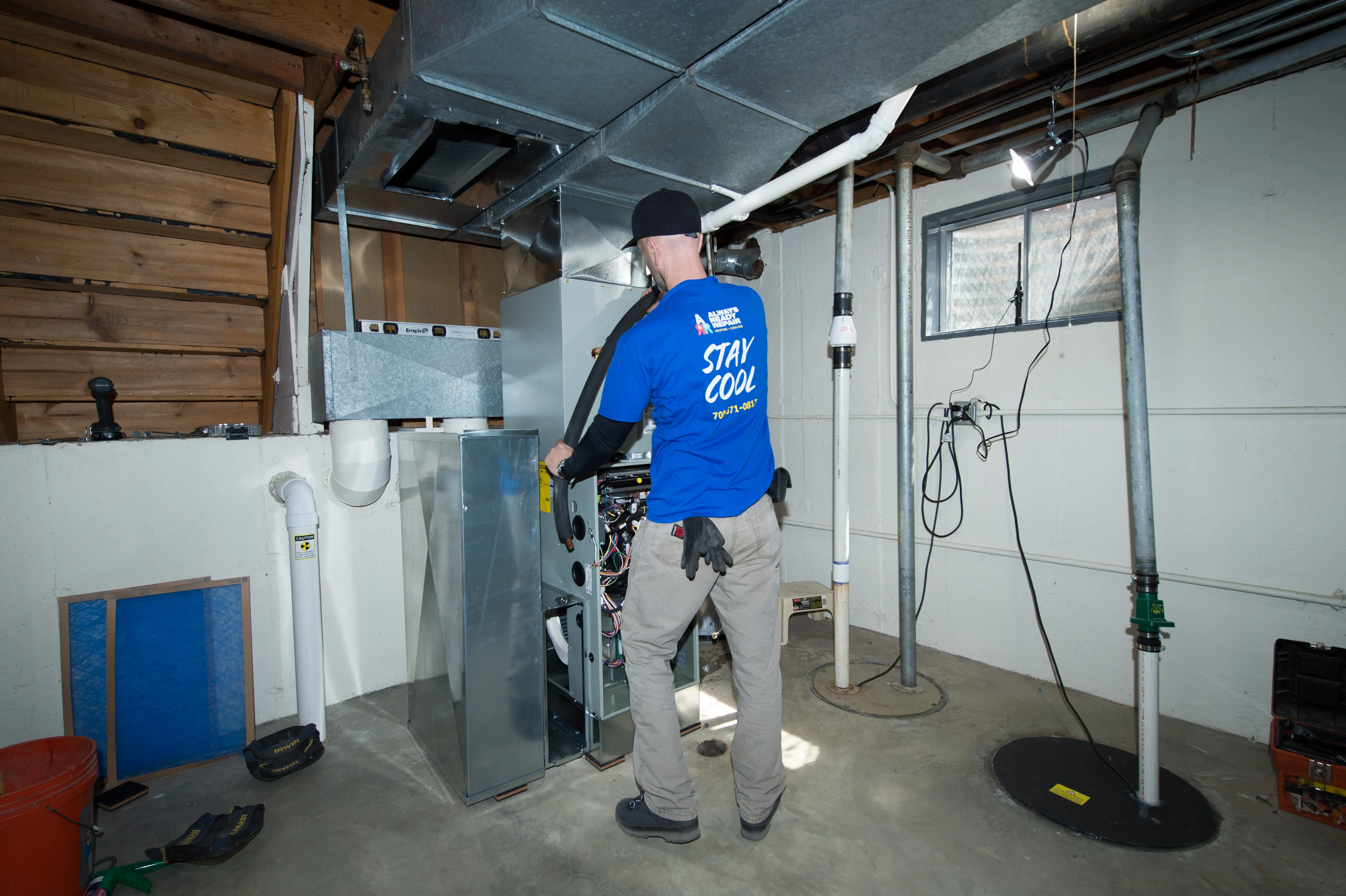 Three-zone hot-water boiler with copper manifold and circulator pumps, installed by Always Ready Repair