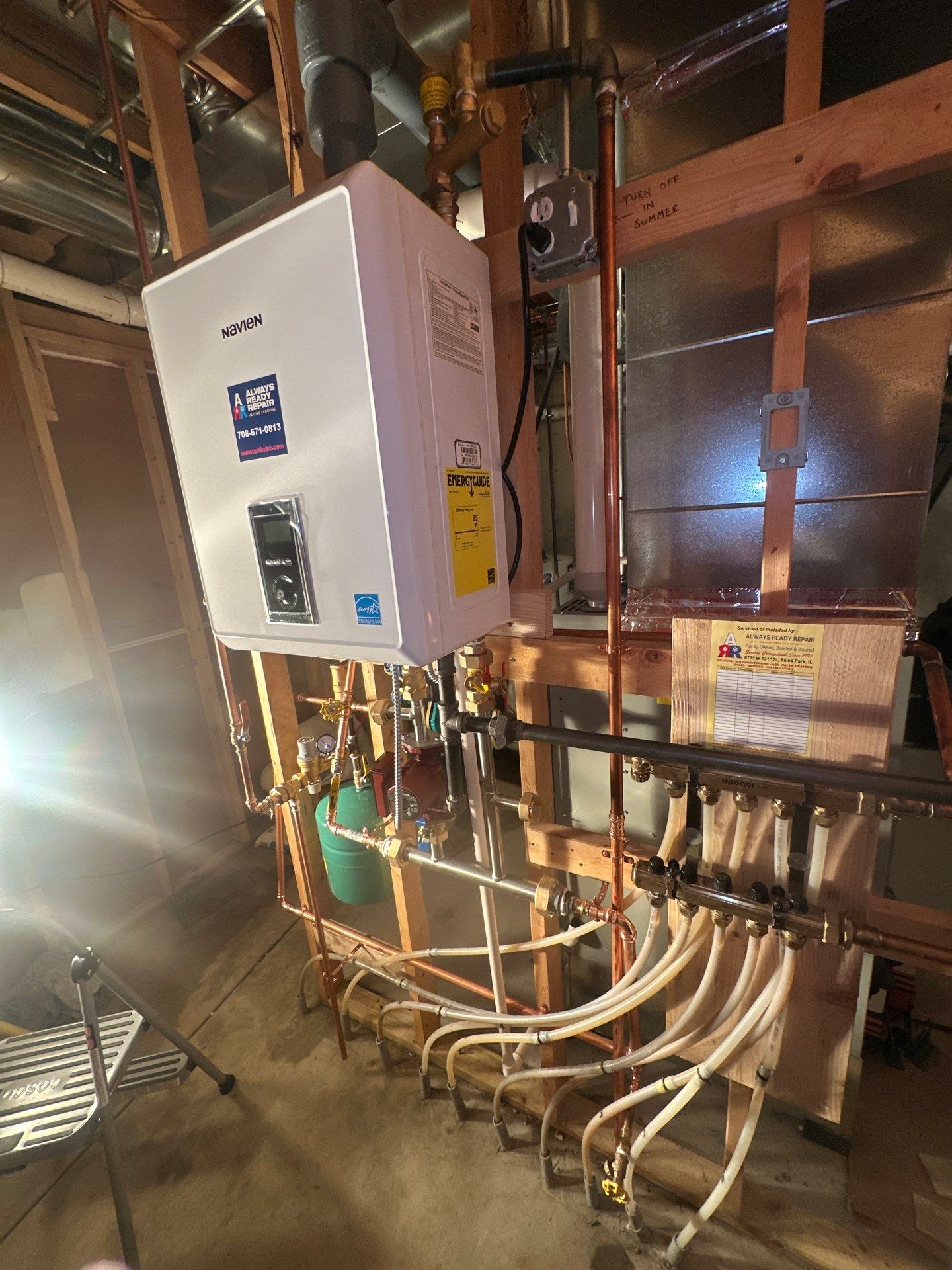 Navien boiler with radiant-heat zone manifold installed by Always Ready Repair