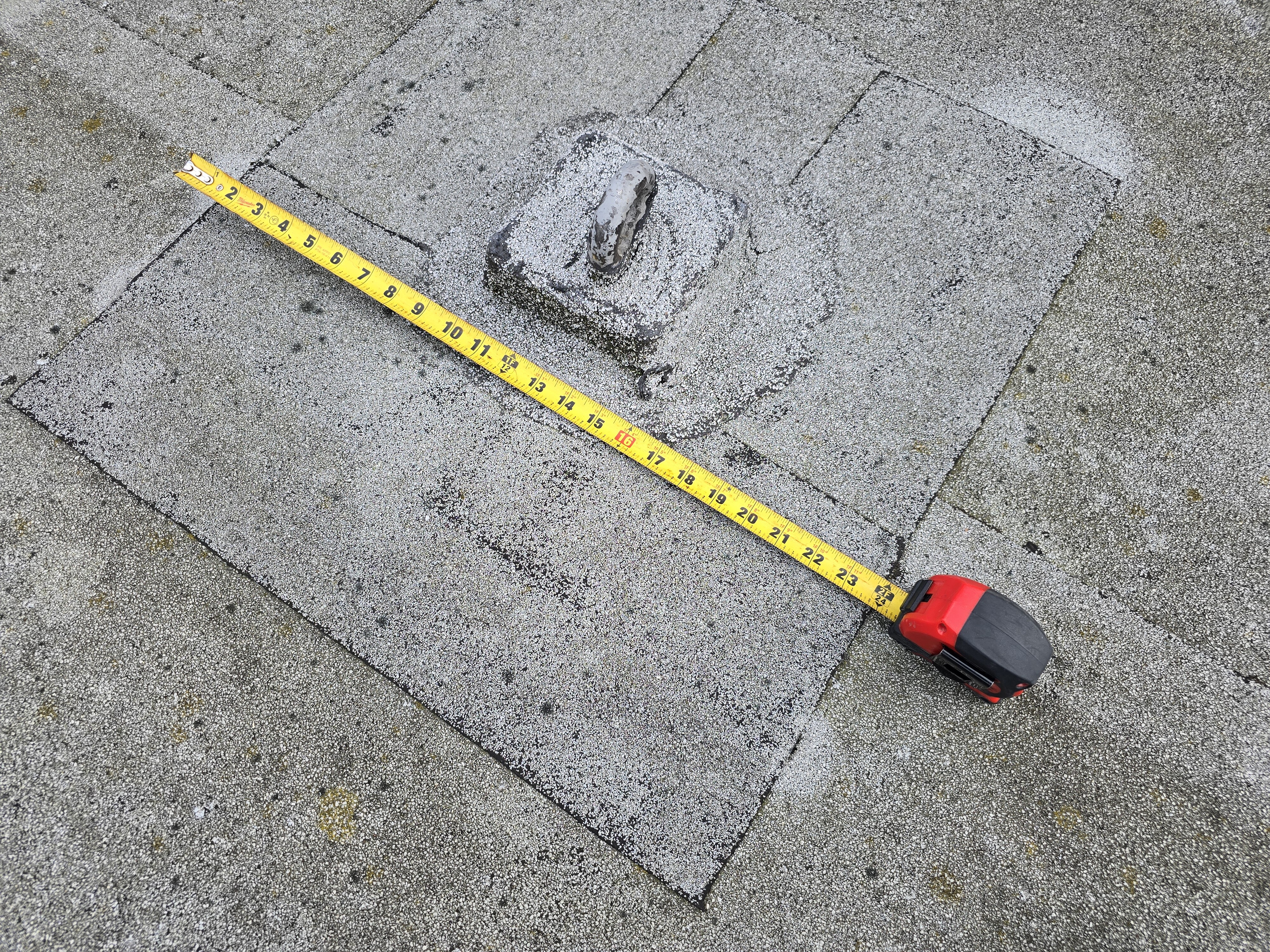 Commercial flat roof technician performing a structured leak detection investigation