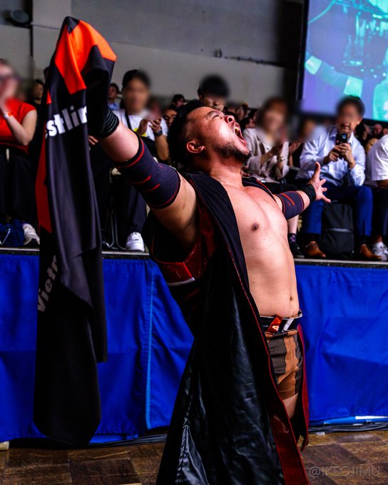 Ares makes his entrance at Korakuen Hall in Tokyo