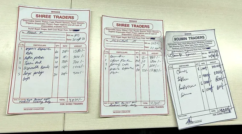 Handwritten supplier bills waiting to be typed into Tally