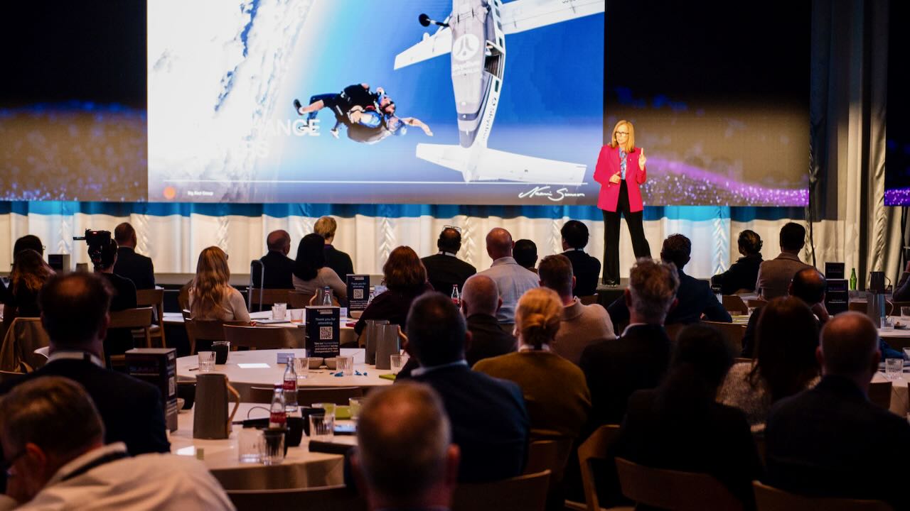 Naomi Simson presenting to a conference audience at The Business Show Australia
