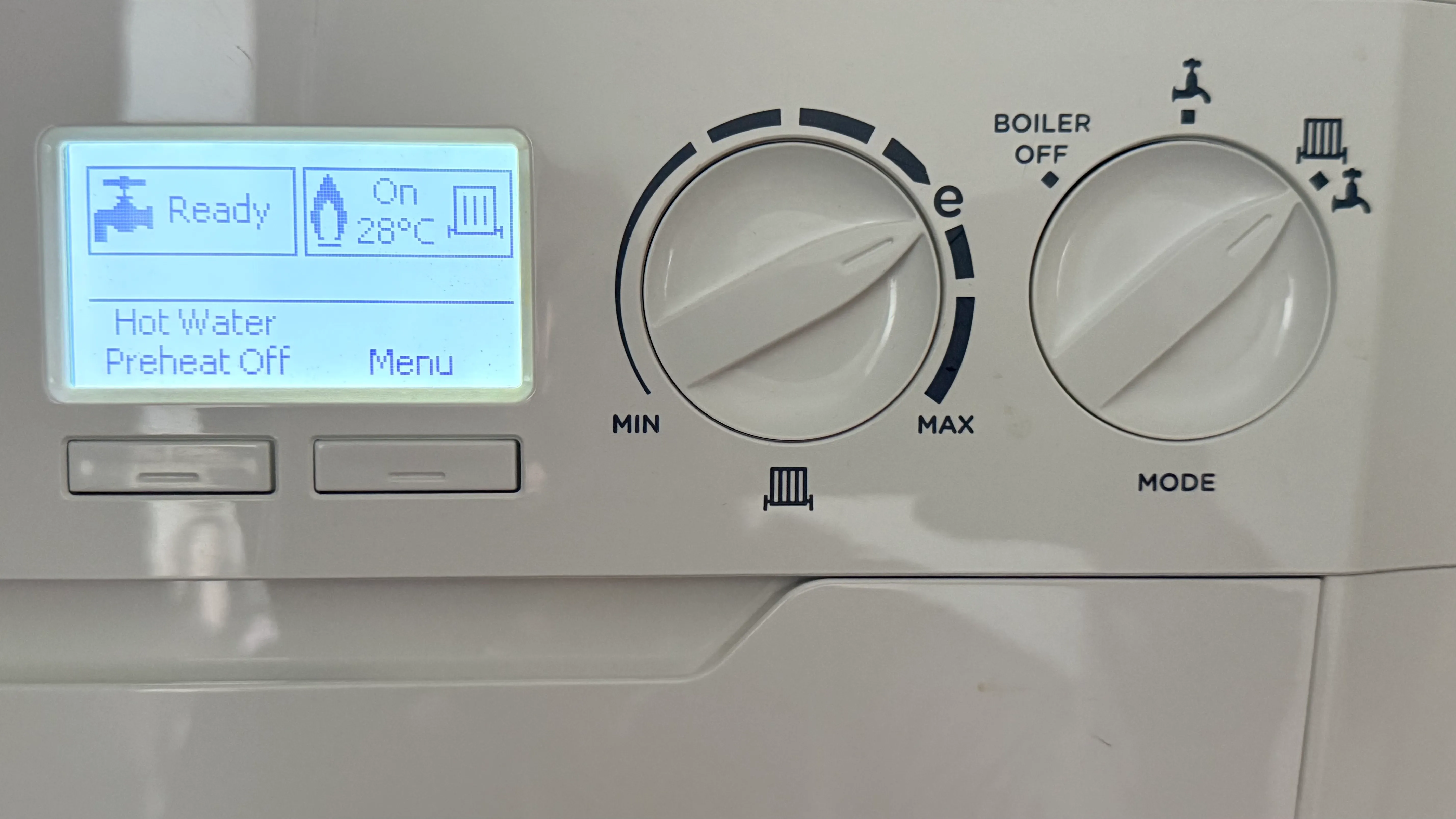 Domestic boiler controls with a digital display and heating dials
