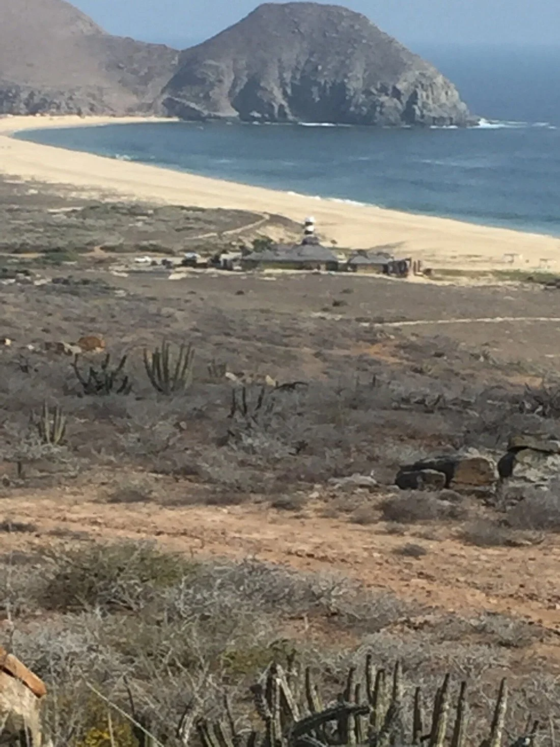 Beach, lighthouse and desert landscape along the Pacific coast near Todos Santos