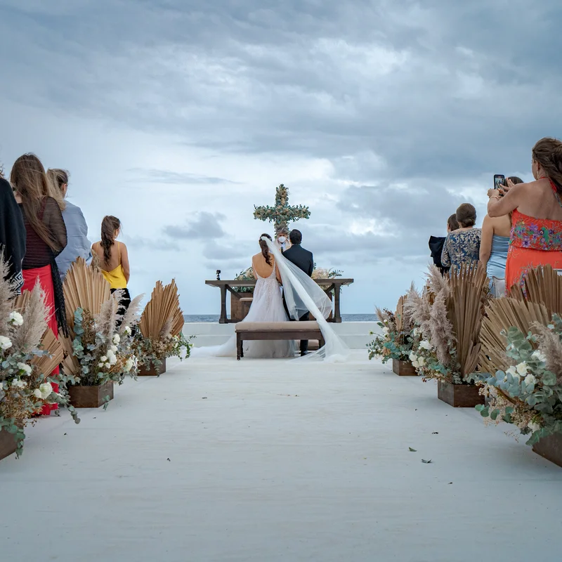 Wedding ceremony by the sea at a Grupo Guaycura setting in Todos Santos