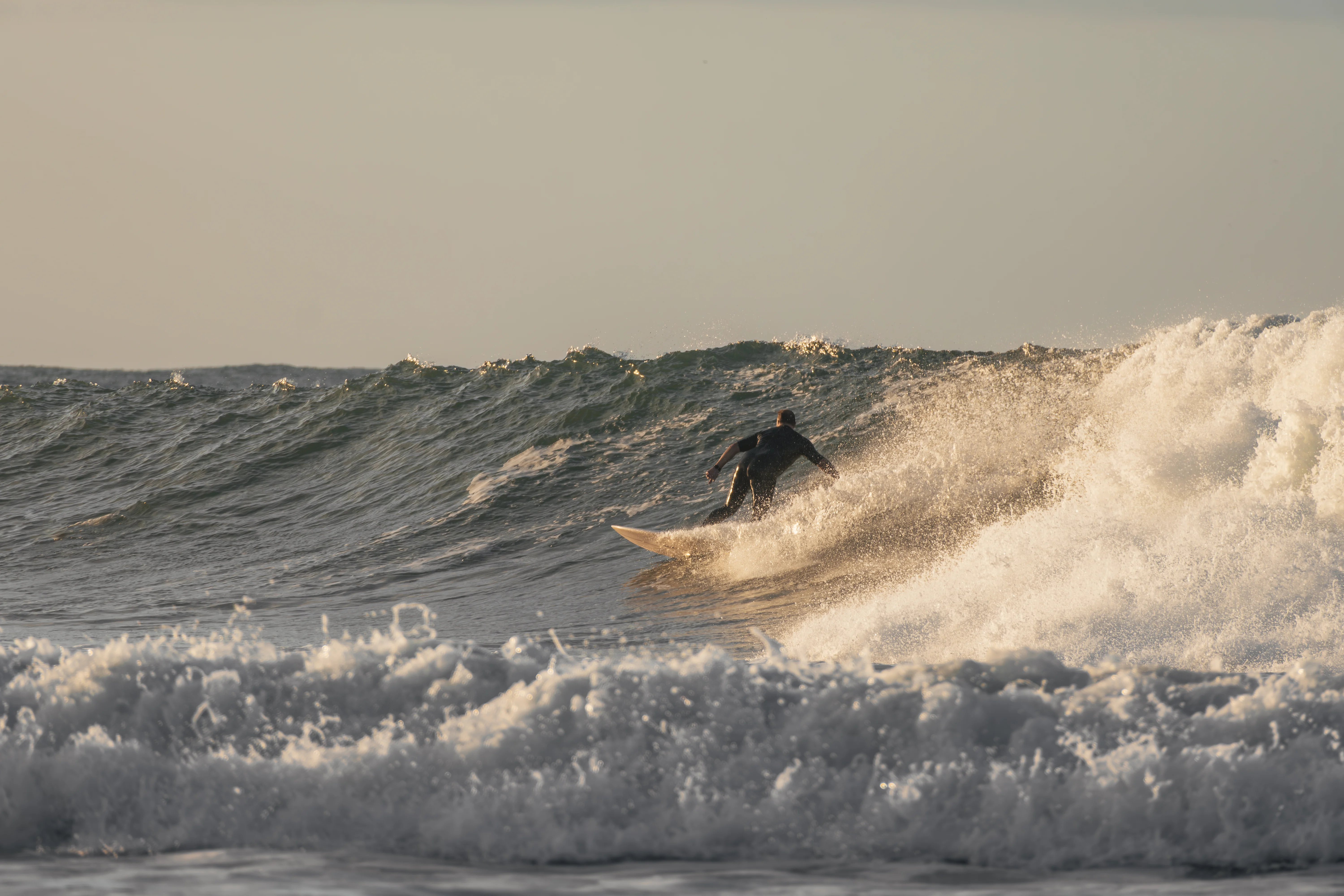Surfer on a Pacific wave near Todos Santos