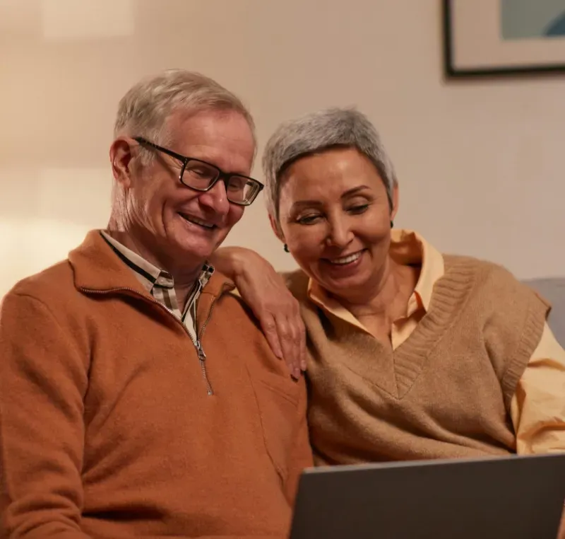 Seniors using technology together