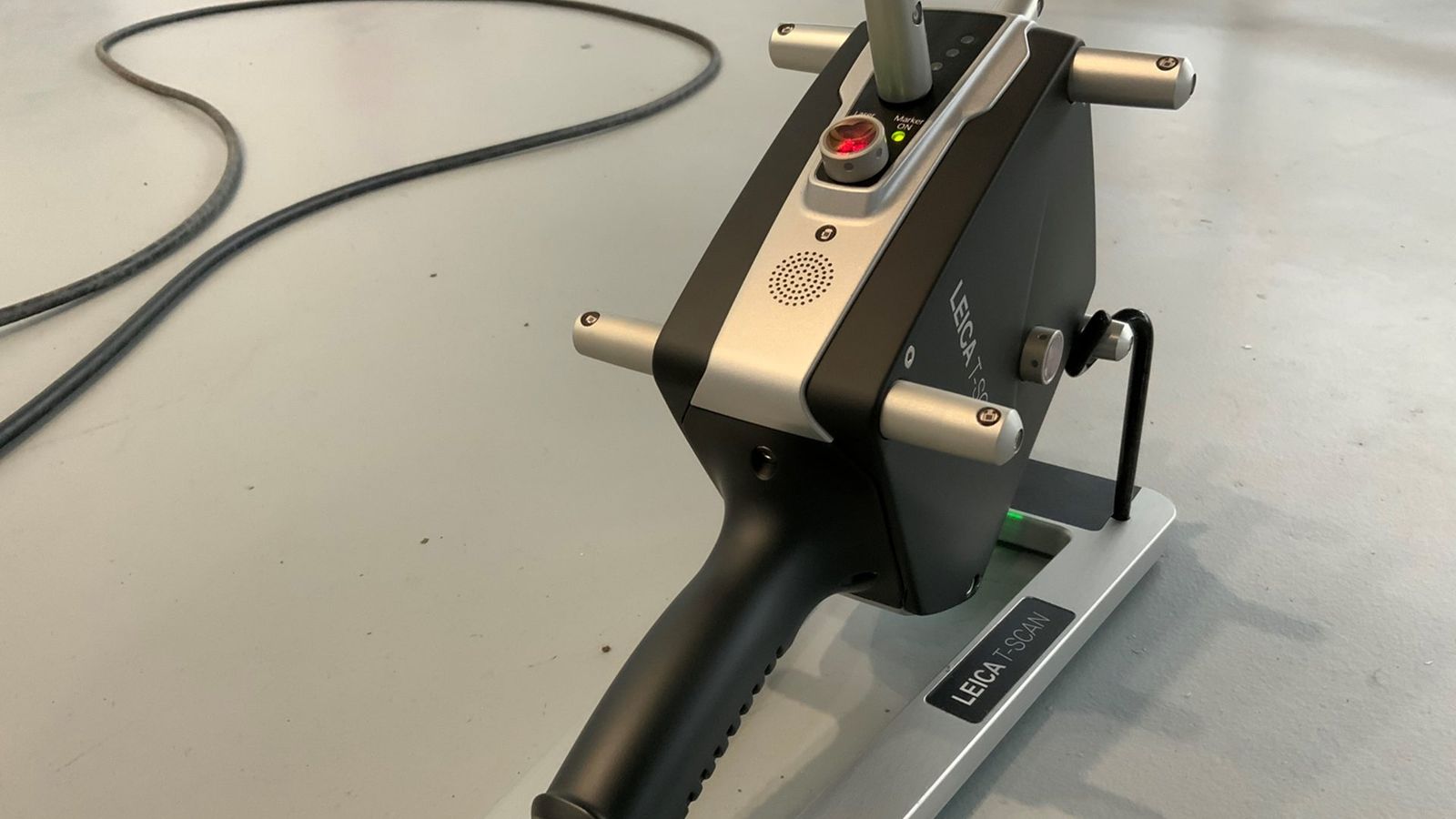 Leica T-Scan handheld laser scanner used with a laser tracker