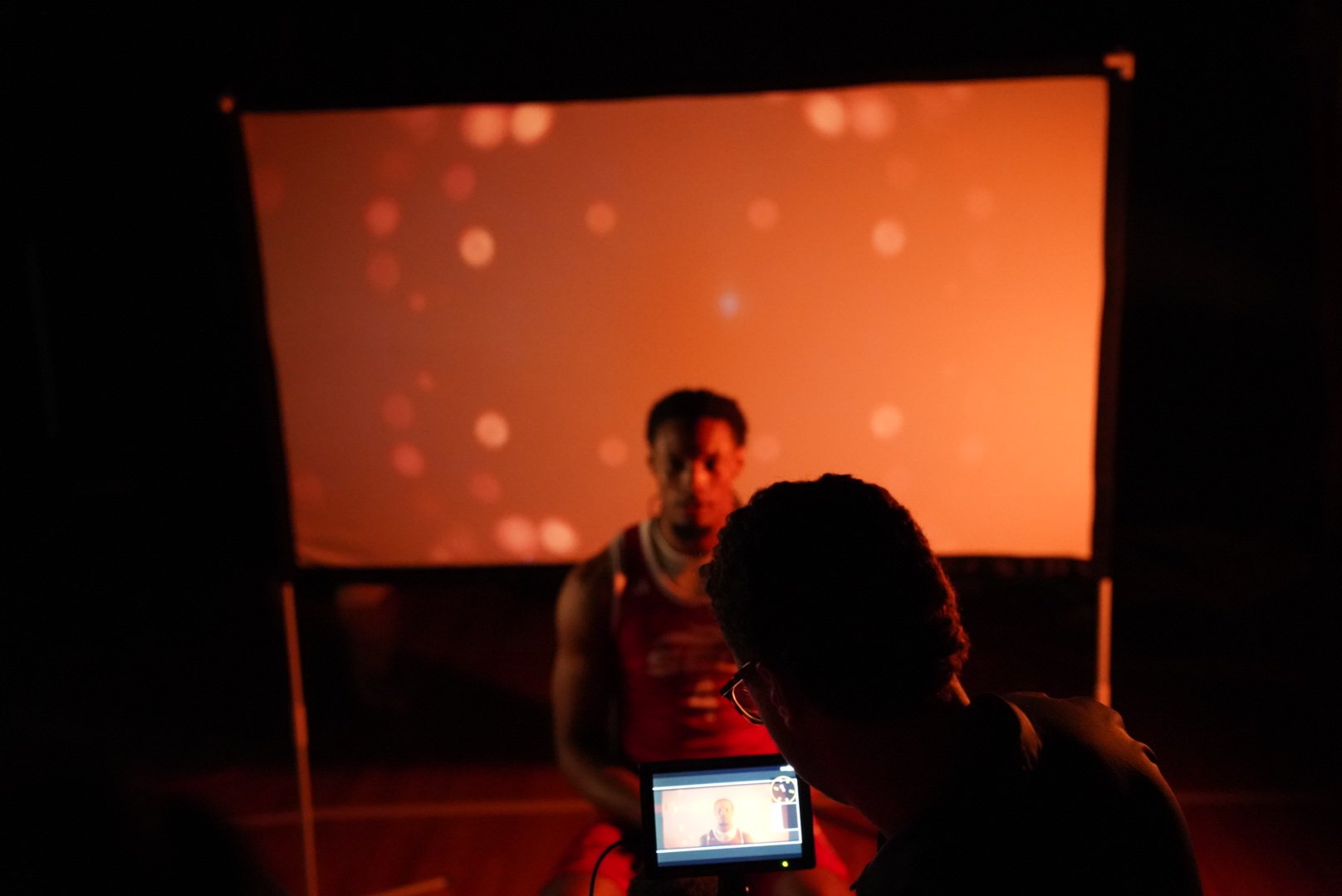 Checking an interview shot on the camera monitor