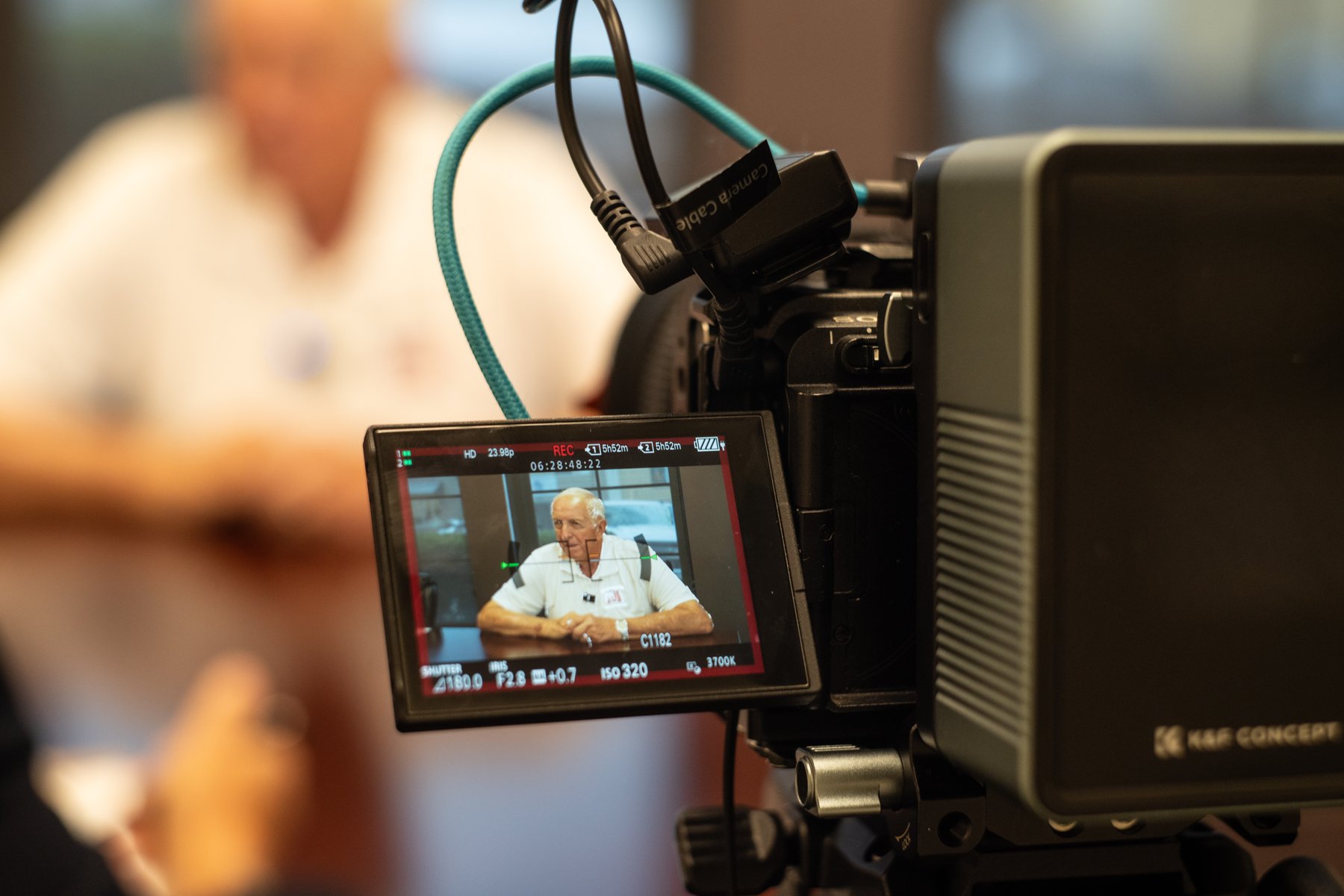 An interview framed on the camera monitor