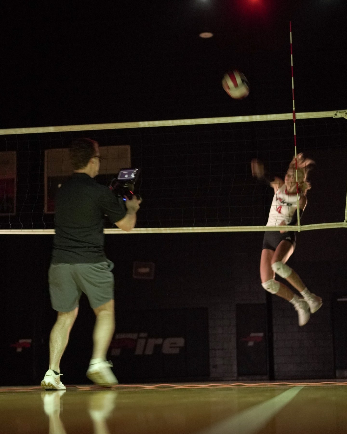 Filming a volleyball player in action