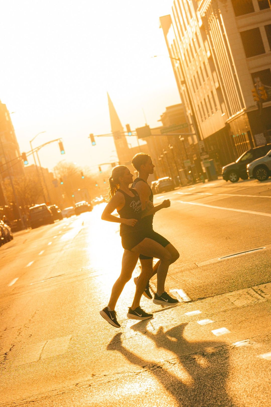 Pacer Running athletes on a run through downtown Indianapolis at sunset