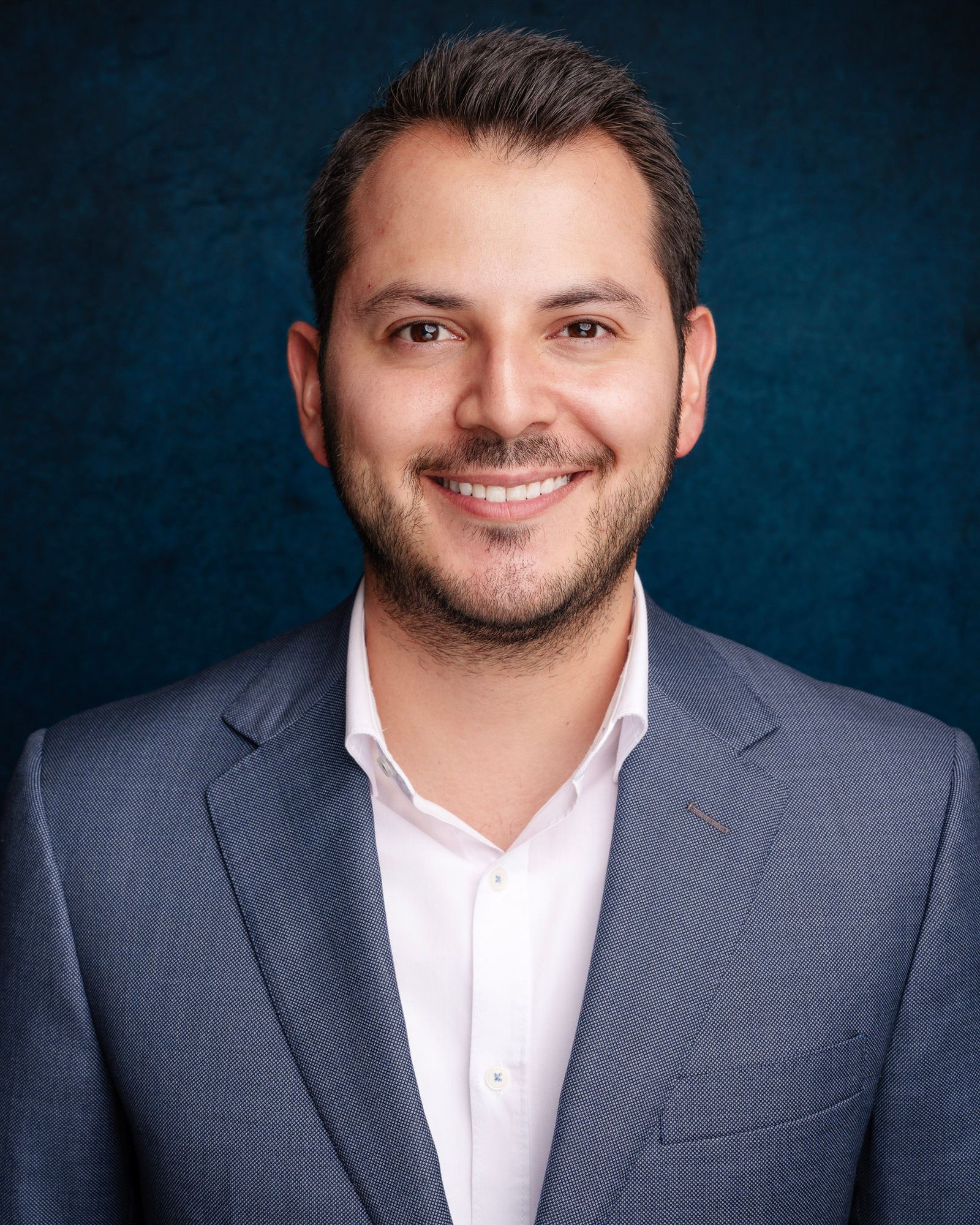 Professional headshot photographed by Uncharted Media