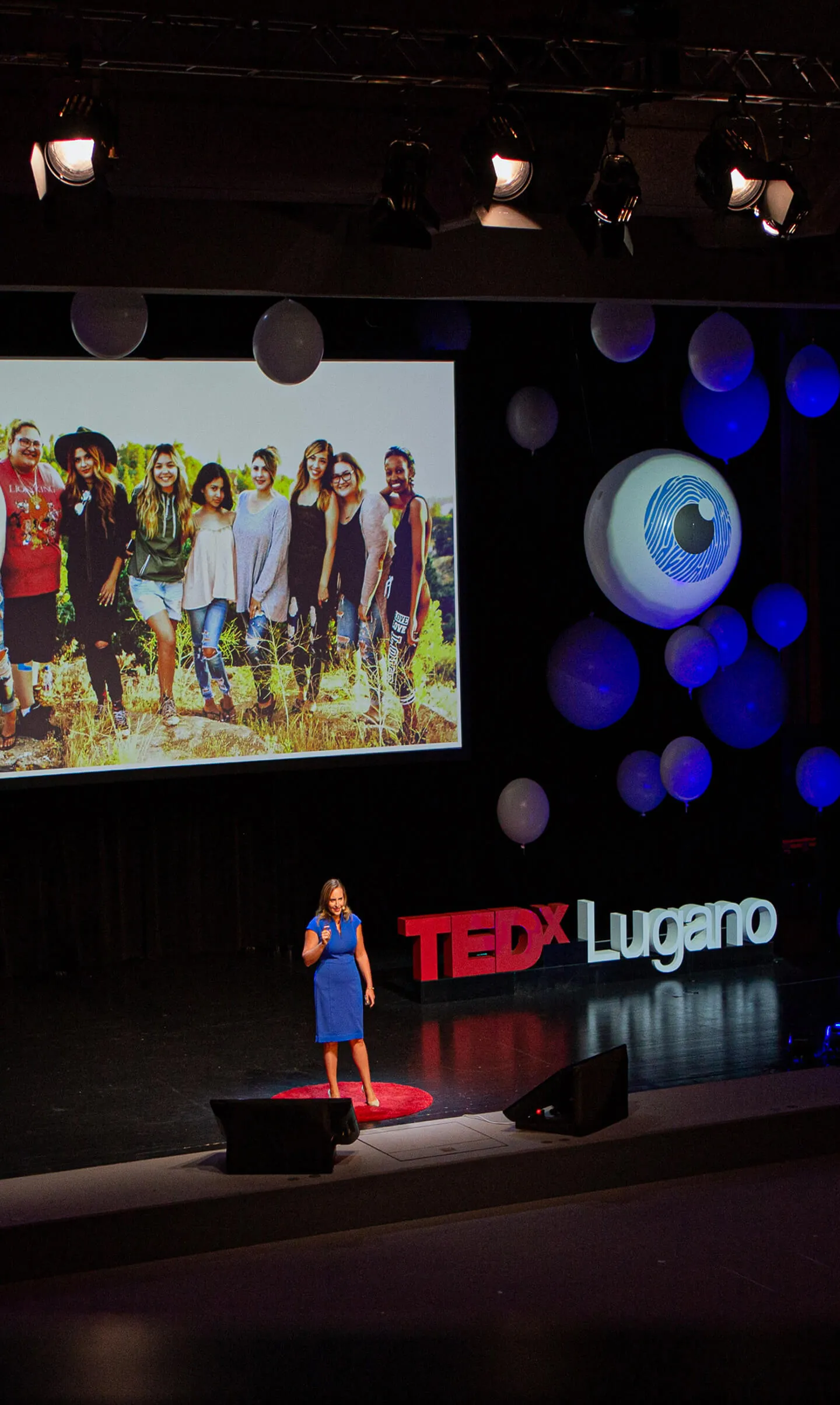 Marissa Fayer on the TEDxLugano stage