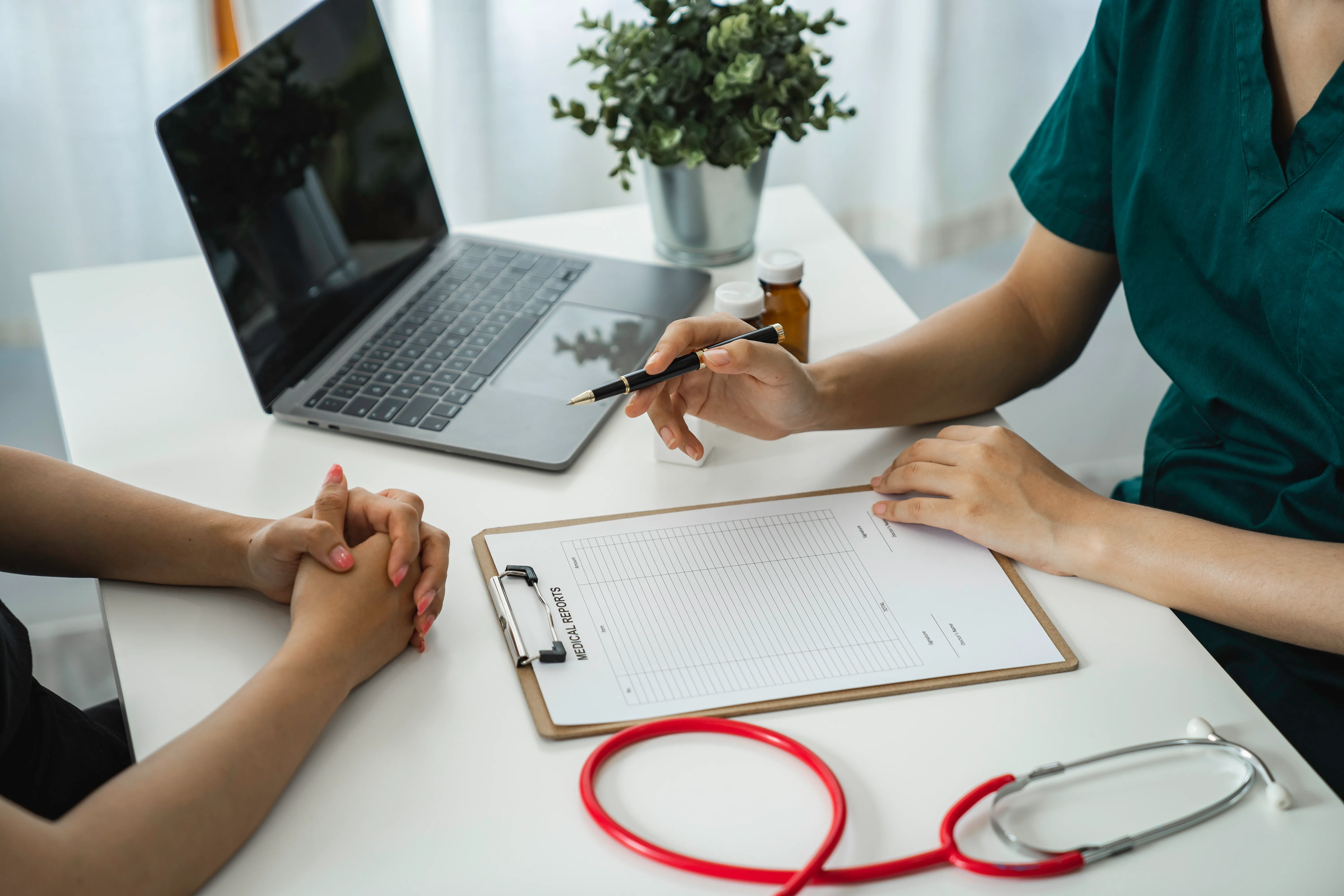 Consultation between a clinician and a client at Omnia Lifestyle