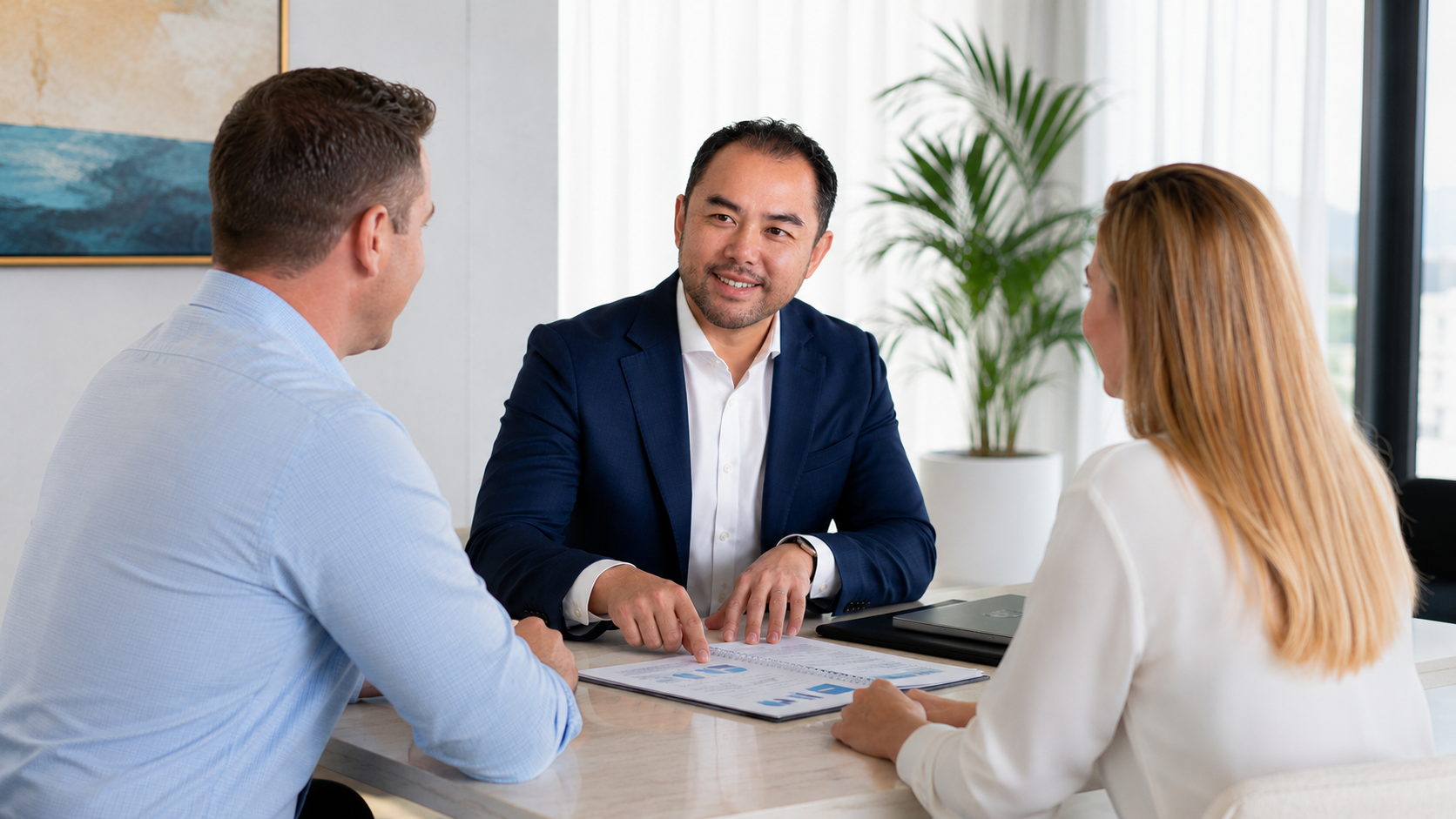 Michael Sik meeting with clients at FinPeak Advisers