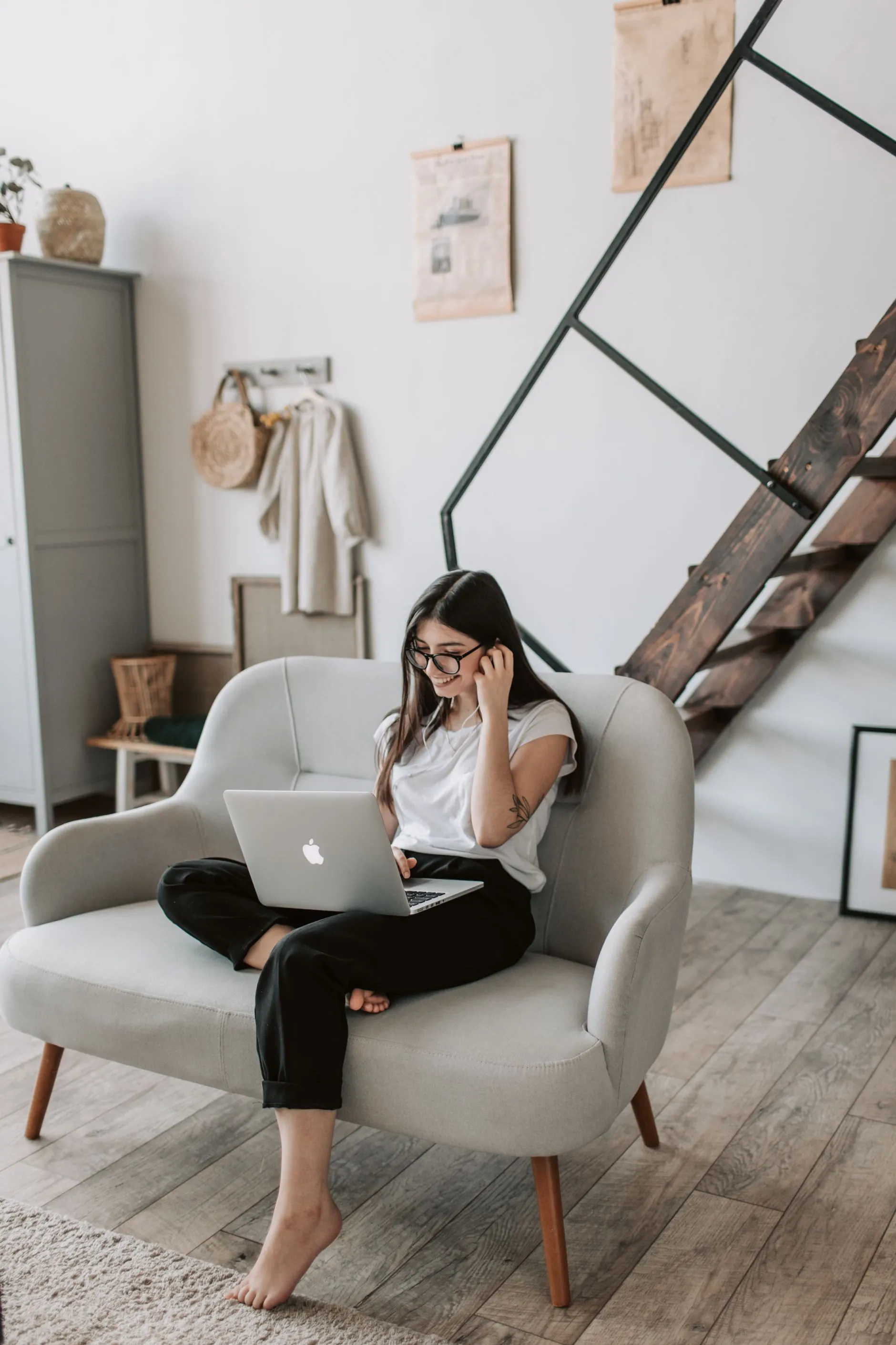 A person filing their personal tax return on a laptop at home