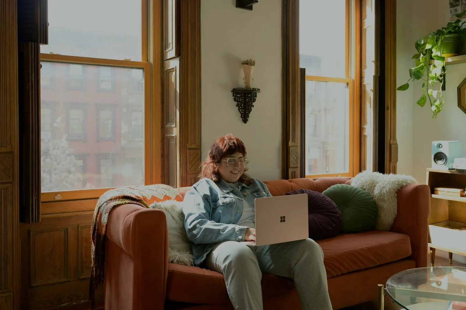 Person reviewing their finances on a laptop at home