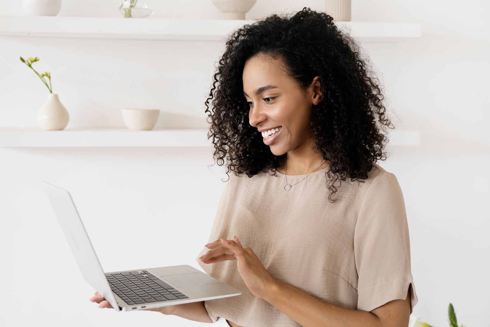 A person reviewing their personal tax plan on a laptop at home