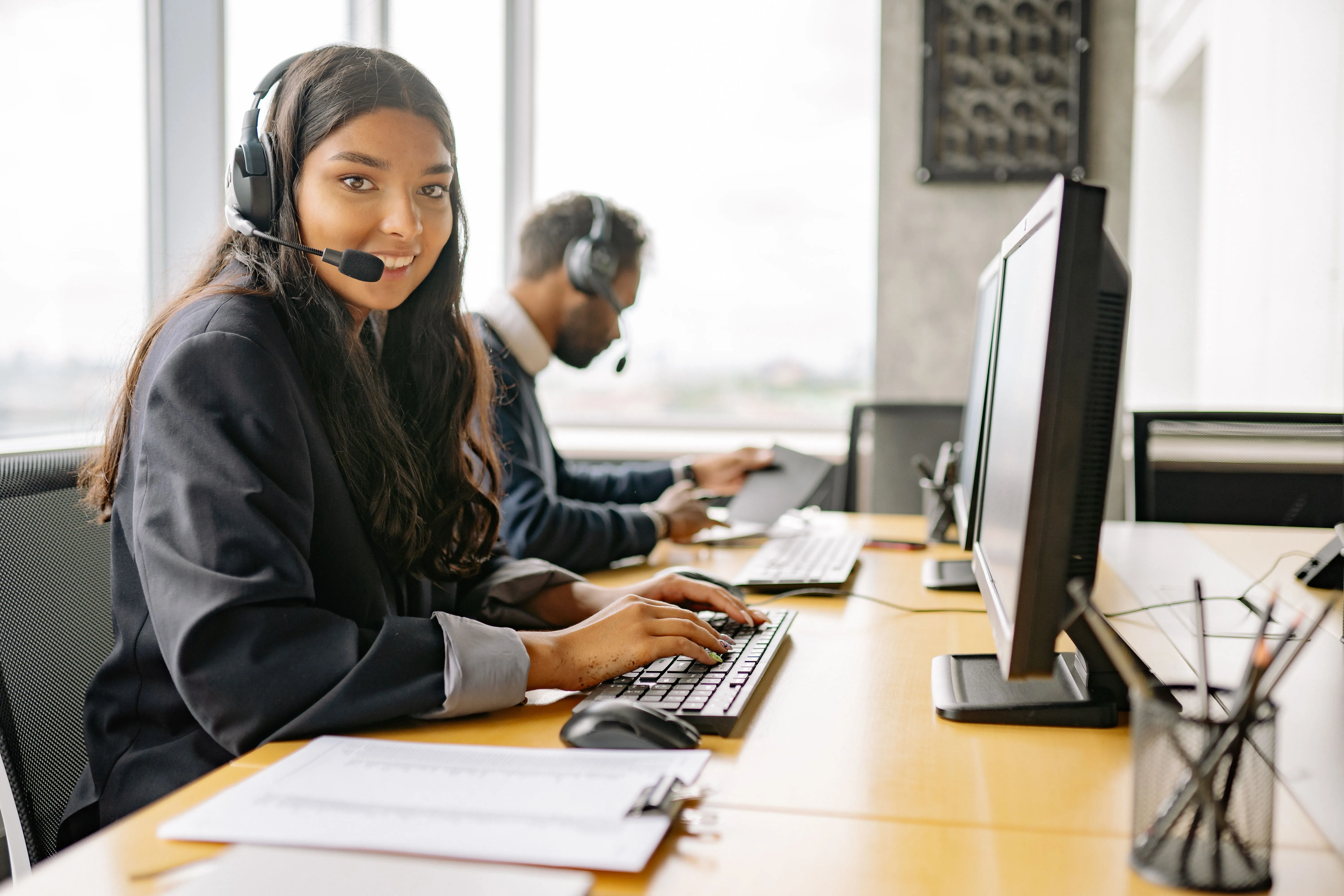A Count myAccount support specialist at a desk, ready to help
