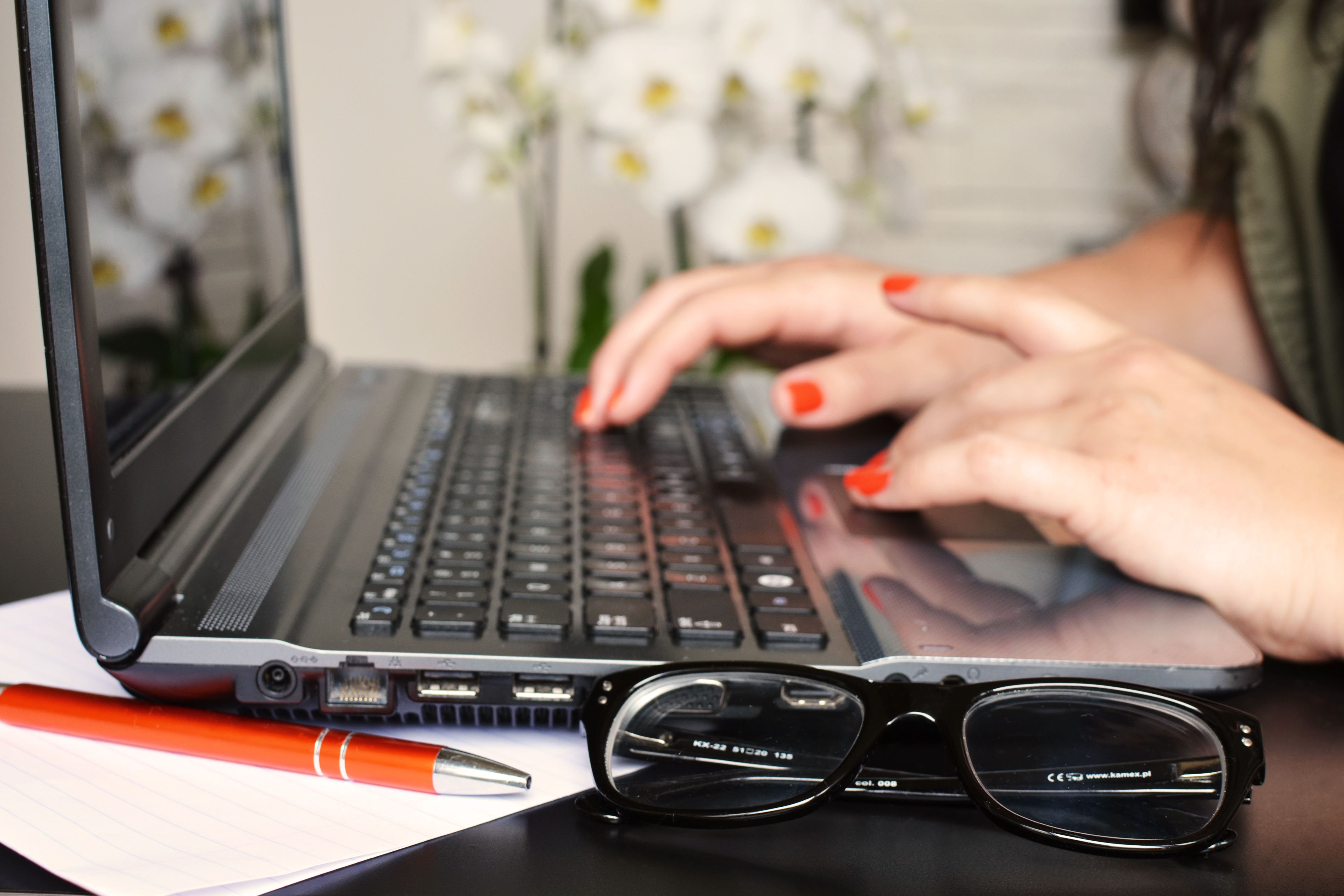 Reviewing payroll details on a laptop during setup