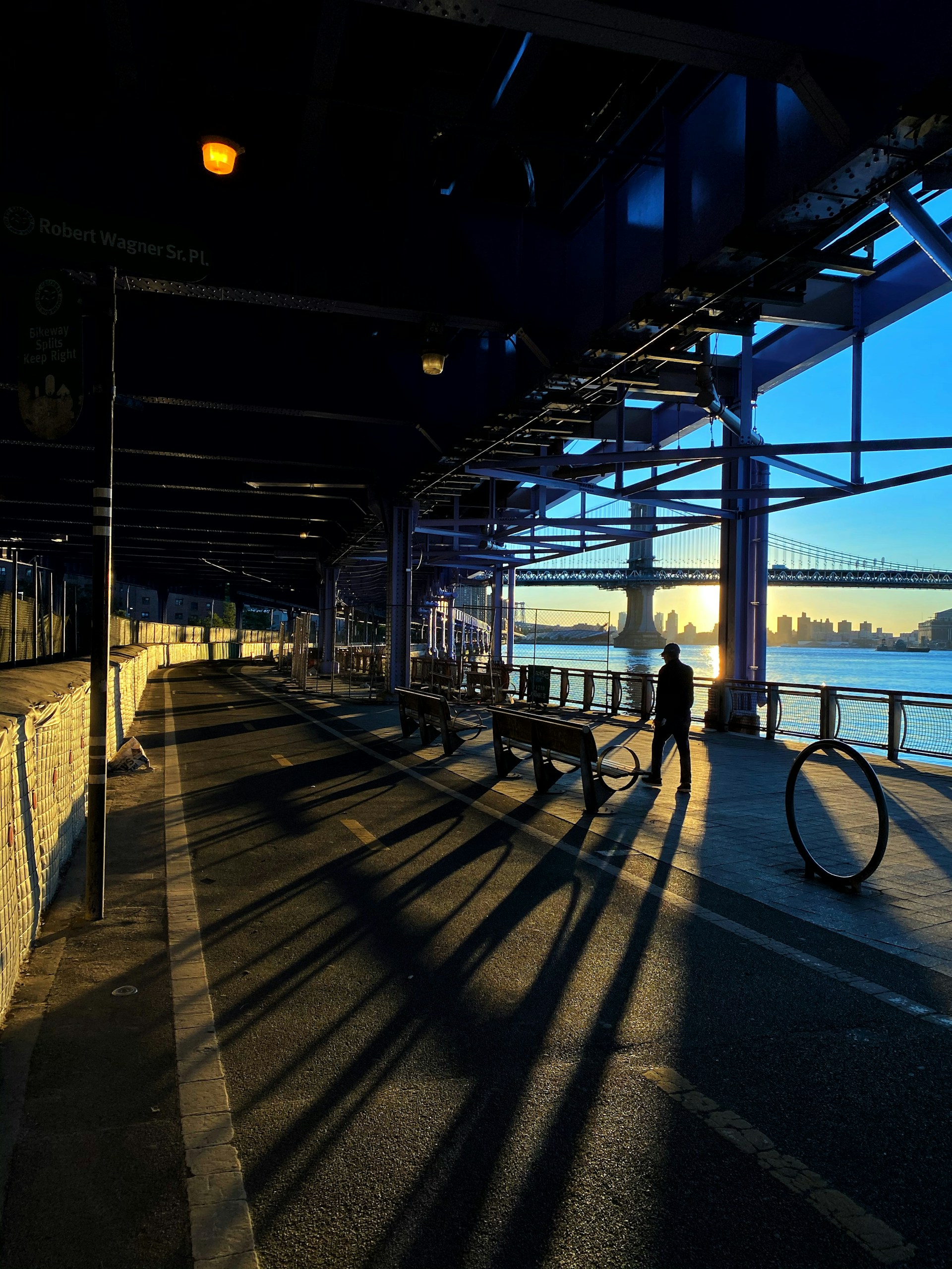 Sunrise under the Manhattan Bridge on the Lower East Side waterfront