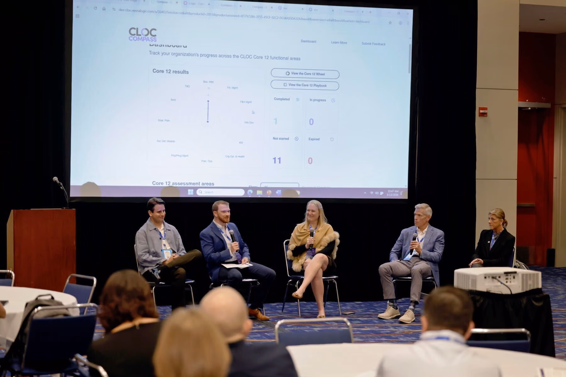 CLOC Compass demo on stage during the panel