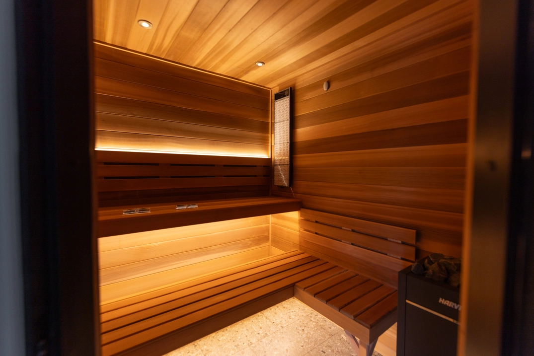 Custom indoor cedar sauna in an Alpine home