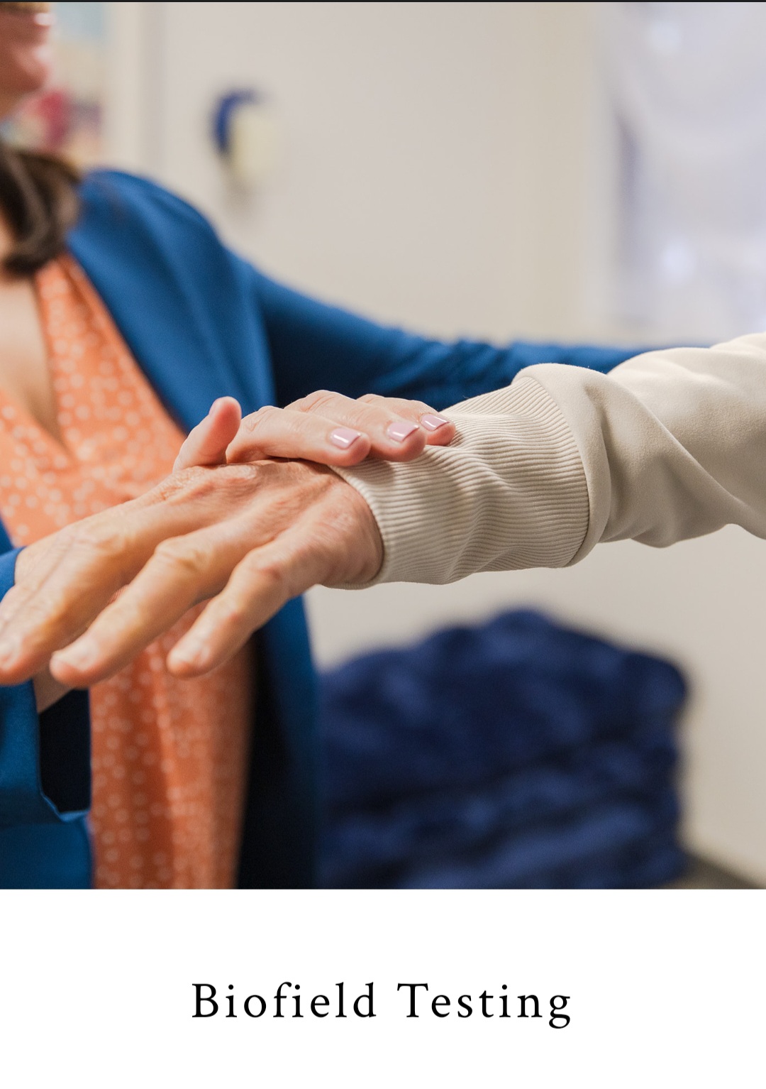 Biofield Testing practitioner testing a client's hand