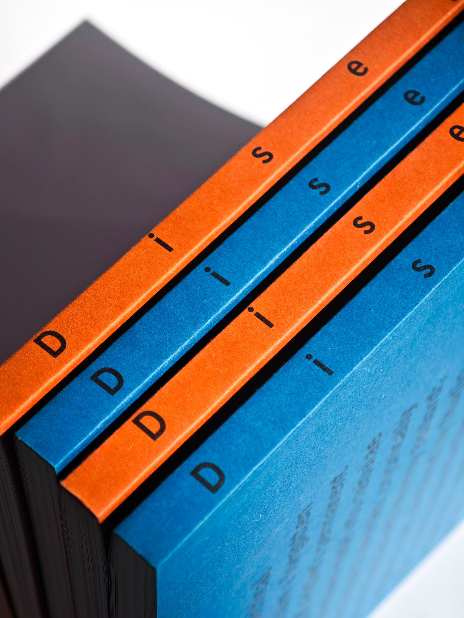 Stacked Disegno publications, spine detail
