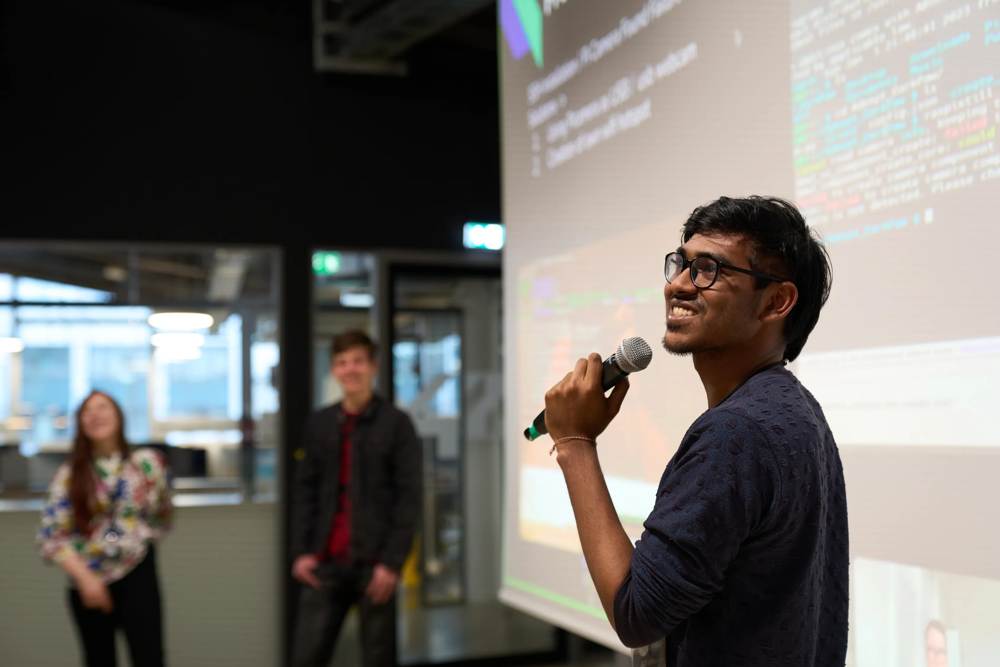 A student presenting during a campus talk
