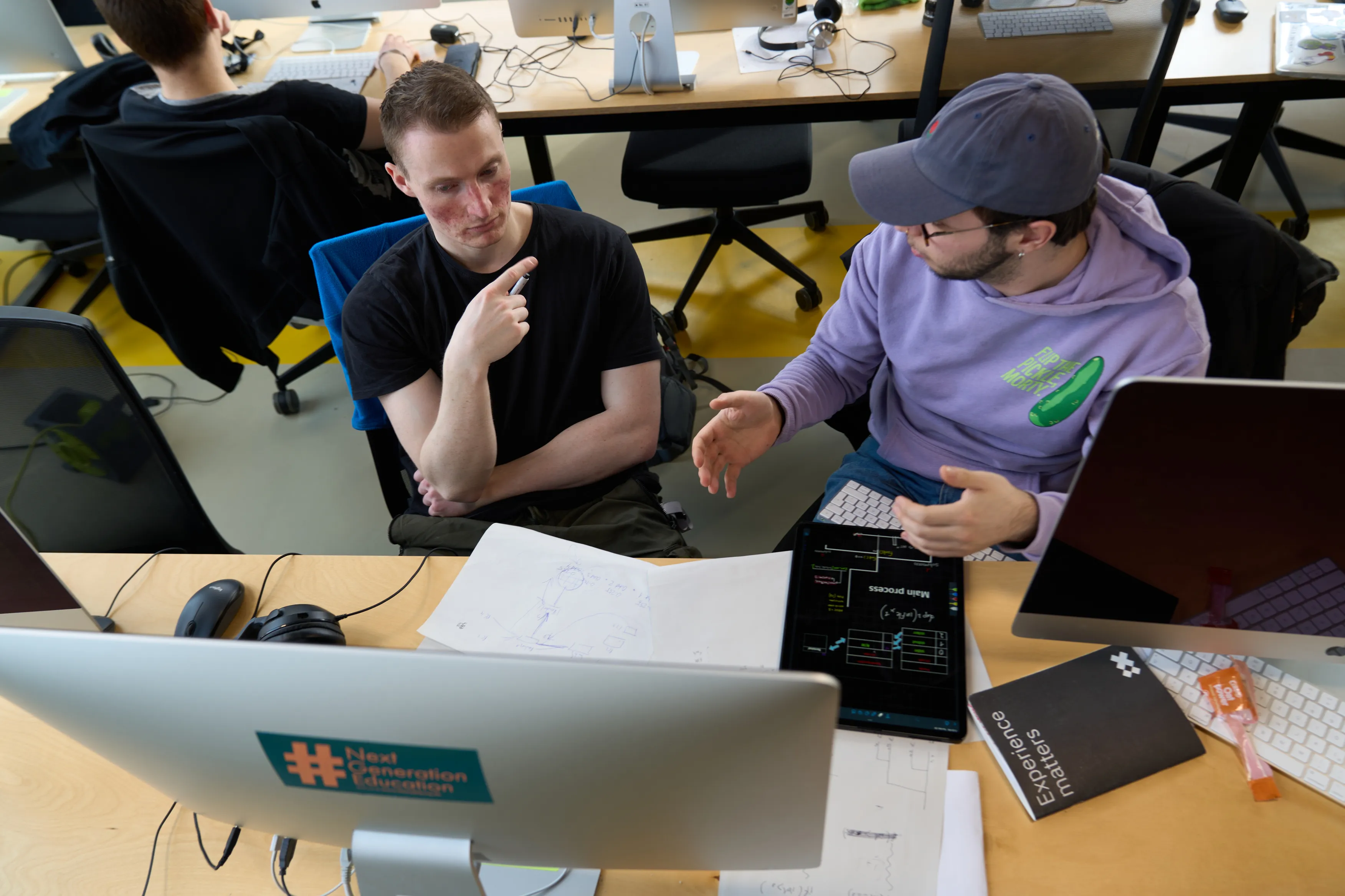 Students working through a group project together at 42 Wolfsburg