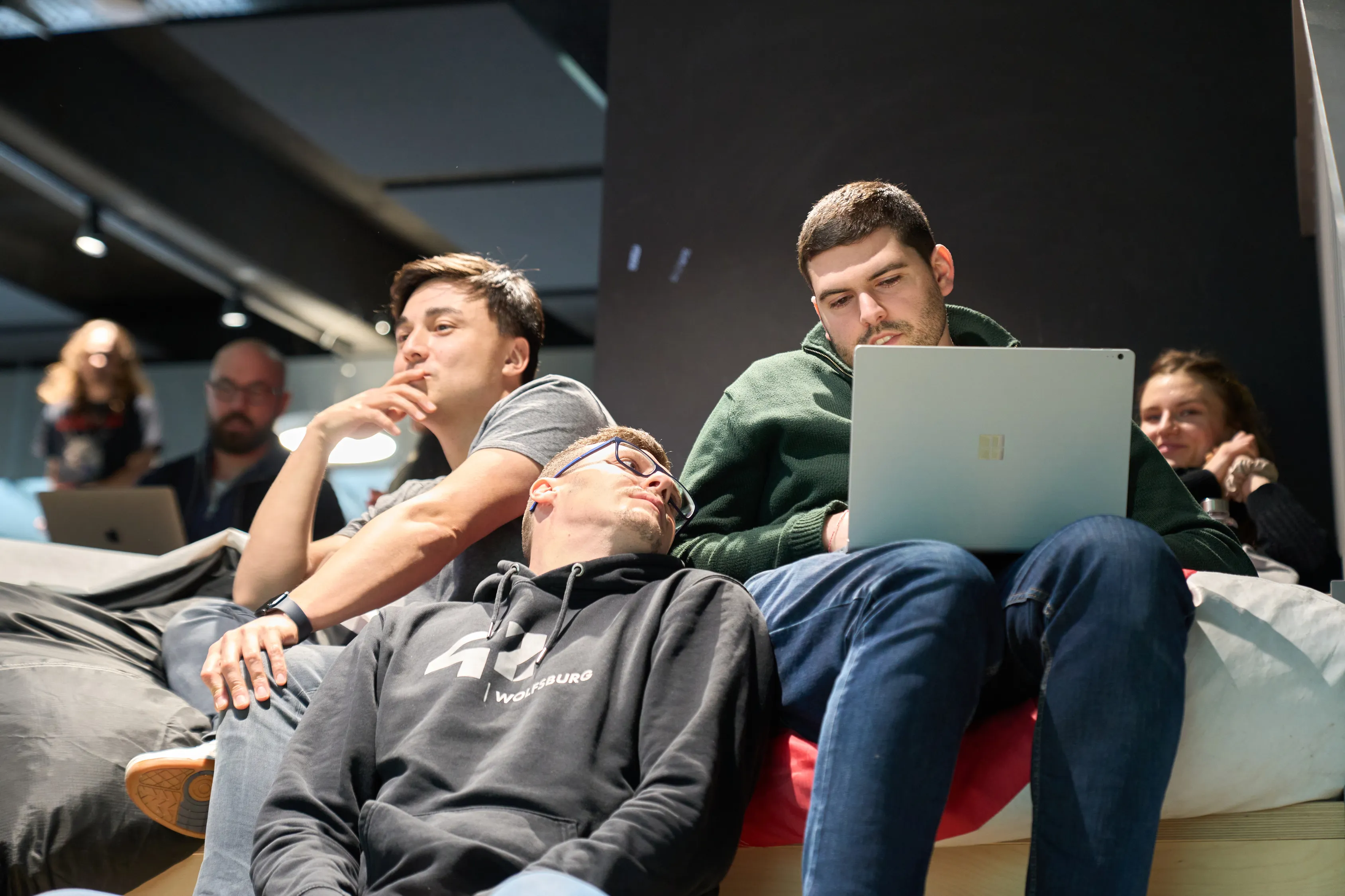Students relaxing on beanbags during a campus event