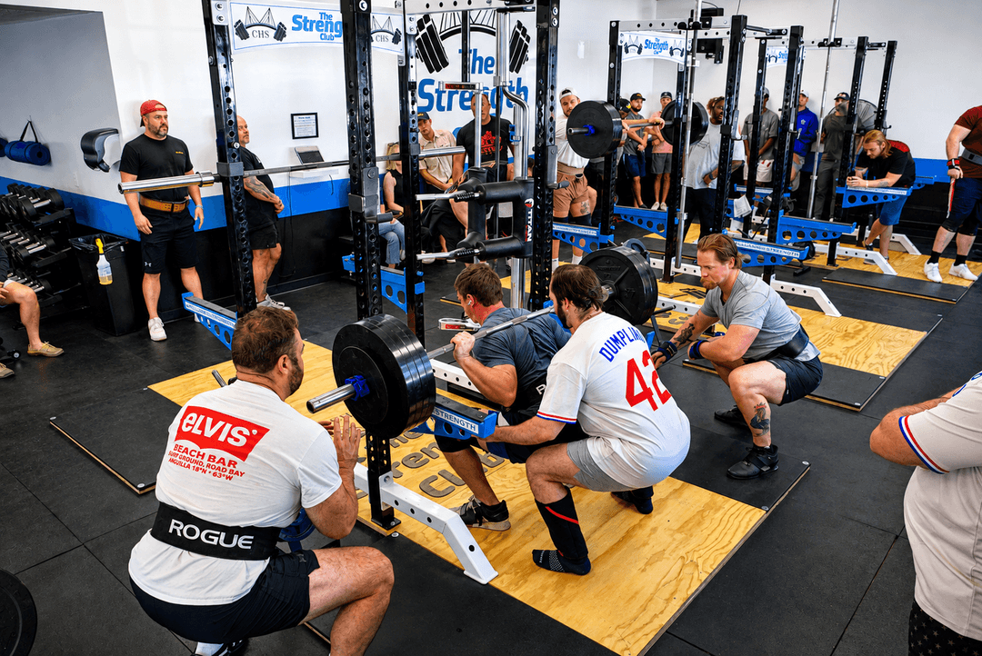 Lifters, spotters and spectators filling the floor during the King of the Hill powerlifting meet at The Strength Club in Charleston, SC