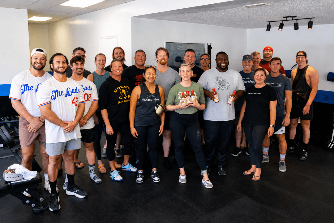 Competitors gathered for a group photo after the King of the Hill powerlifting meet at The Strength Club in Charleston, SC