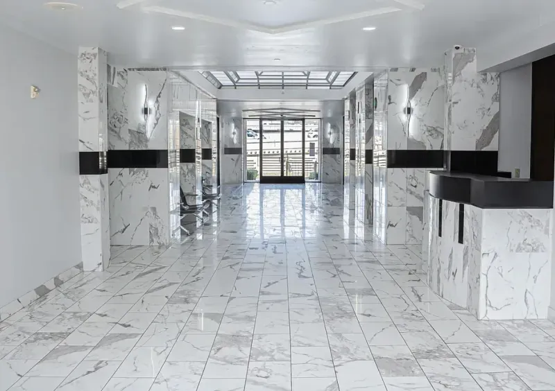 Marble-clad commercial lobby with reception desk