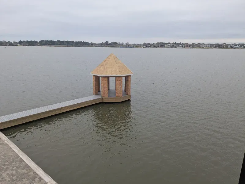 Floating dock gazebo structure under construction