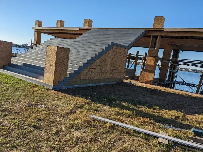 Lakeside boathouse structure under construction