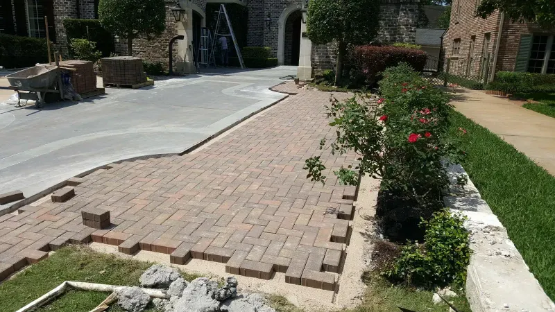 Paver walkway installation at estate entrance