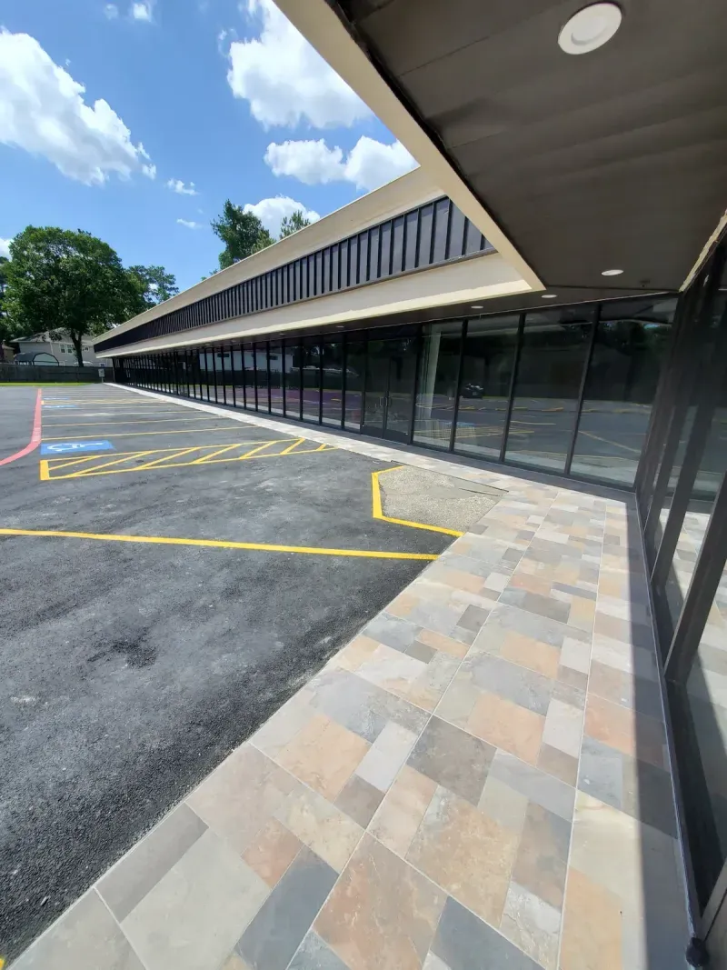 Finished tile walkway at commercial building entrance